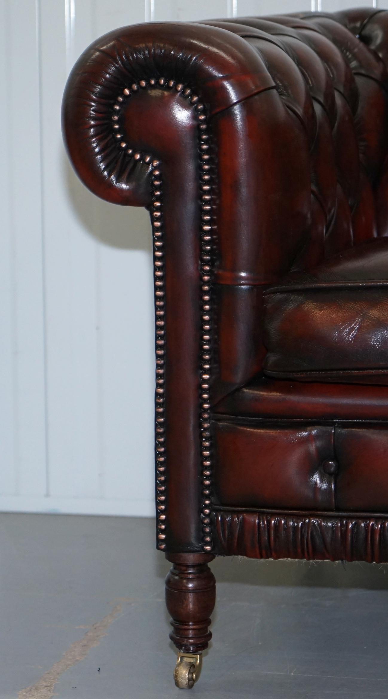 Hand-Carved Restored Bordeaux Leather Chesterfield Club Suite Armchair & Sofa on Turned Legs For Sale