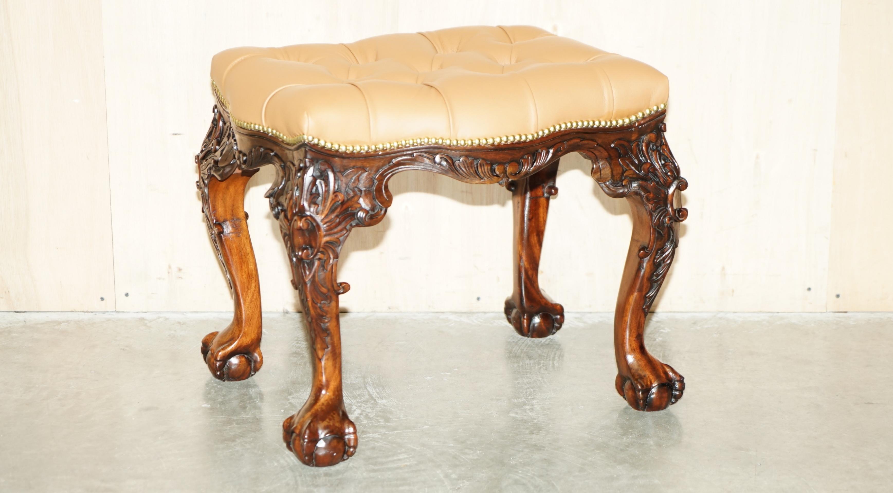 Royal House Antiques

Royal House Antiques is delighted to offer for sale this exquisite fully restored circa 1920 hand carved Piano or Dressing table stool with Chesterfield tufted tan brown leather upholstery and ornately carved Claw & Ball