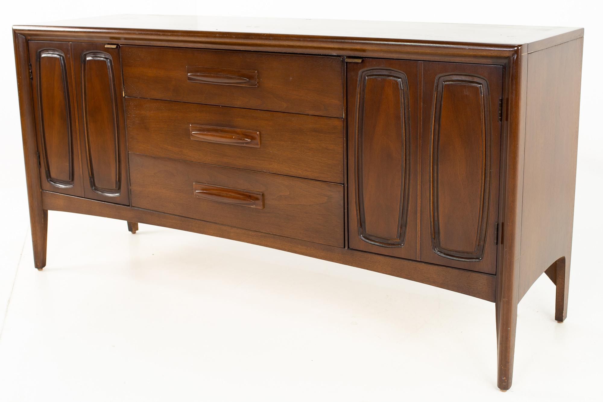 Restored Broyhill emphasis midcentury walnut 9 drawer lowboy dresser credenza
Dresser is: 72 wide x 19 deep x 30.5 high

All pieces of furniture can be had in what we call restored vintage condition. That means the piece is restored upon purchase