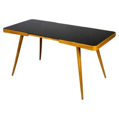 Restored Coffe Table with Black Glass Top by Jiří Jiroutek. 1960s