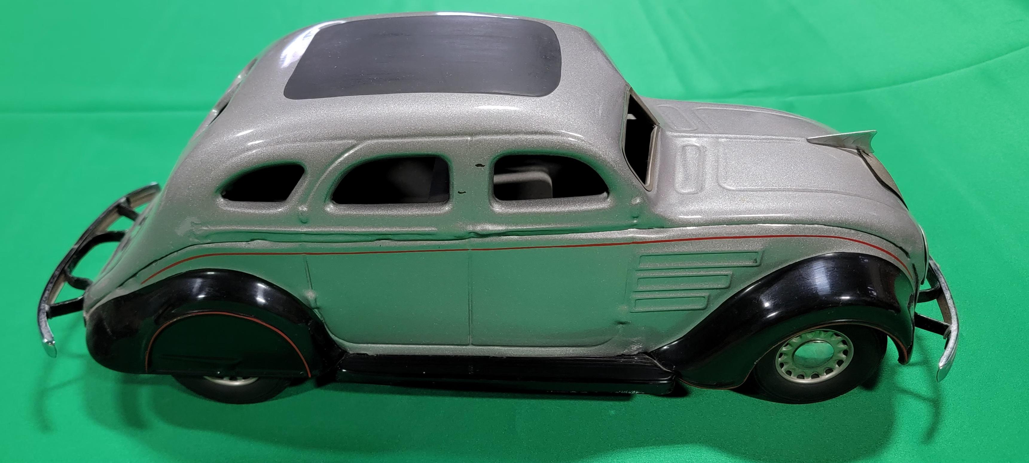 Restored 1934 Chrysler Airflow toy car by Cor-Cor. The Cor-Cor toy company or Corcoran Metal Produts was located in Washington, Indiana (USA) and was in business from 1925-1941. 