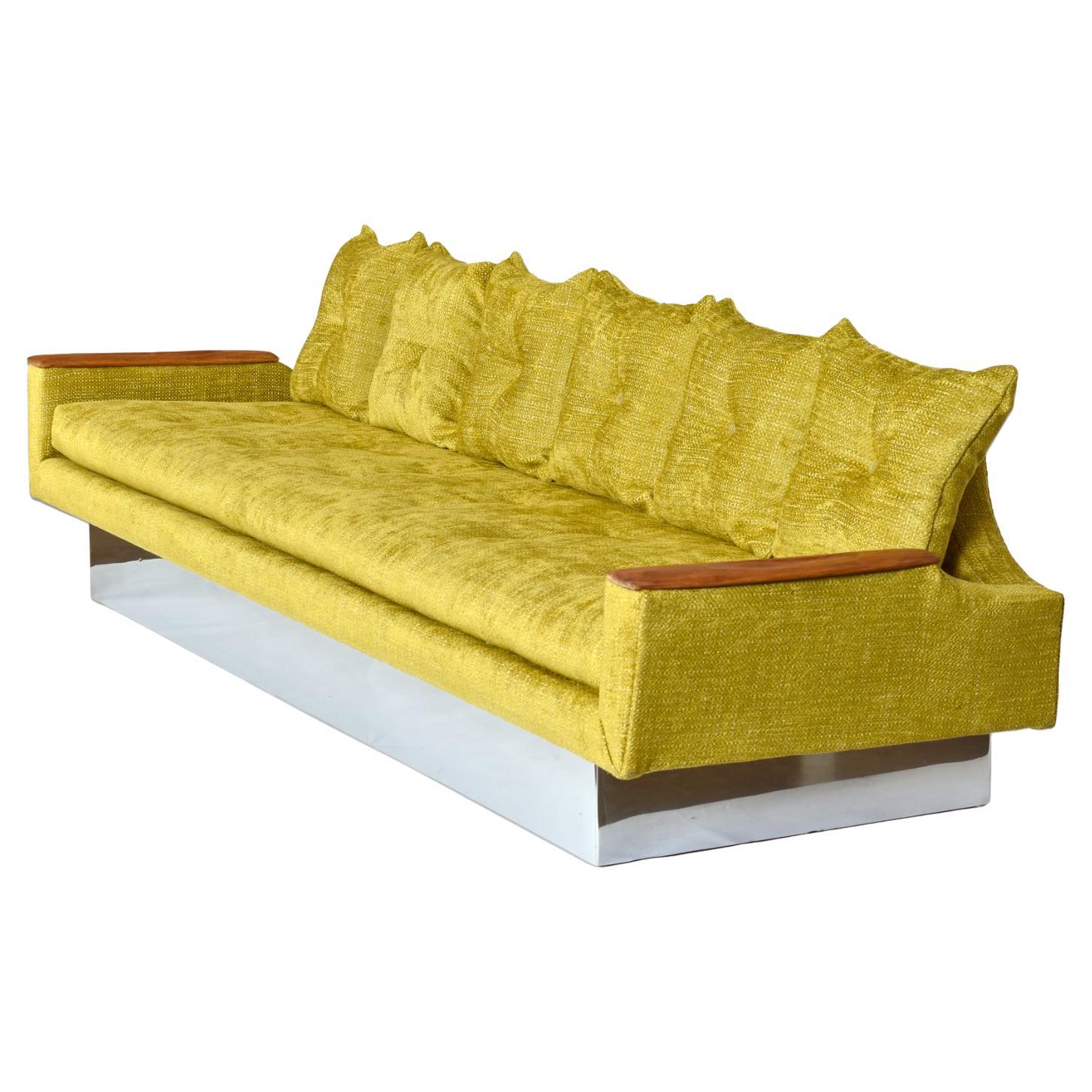 Custom upholstered and fully restored, one of a kind sofa. We married this incredible vintage Pearsall style couch with an uber-sleek chrome 