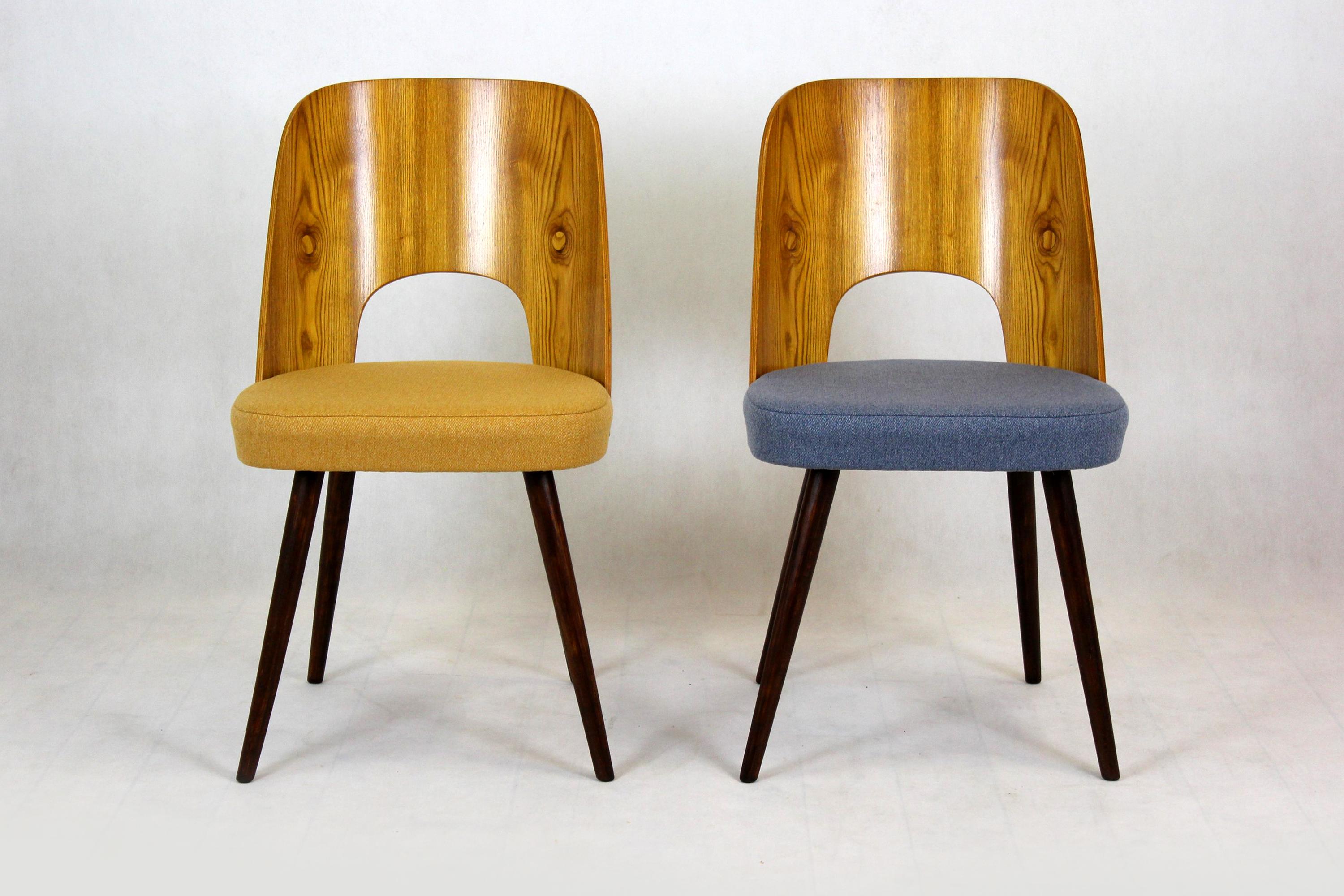 Set of two chairs from Tatra designed by Oswald Haerdtl and produced in the 1960s in former Czechoslovakia. Seats upholstered with new fabric upholstery.
 