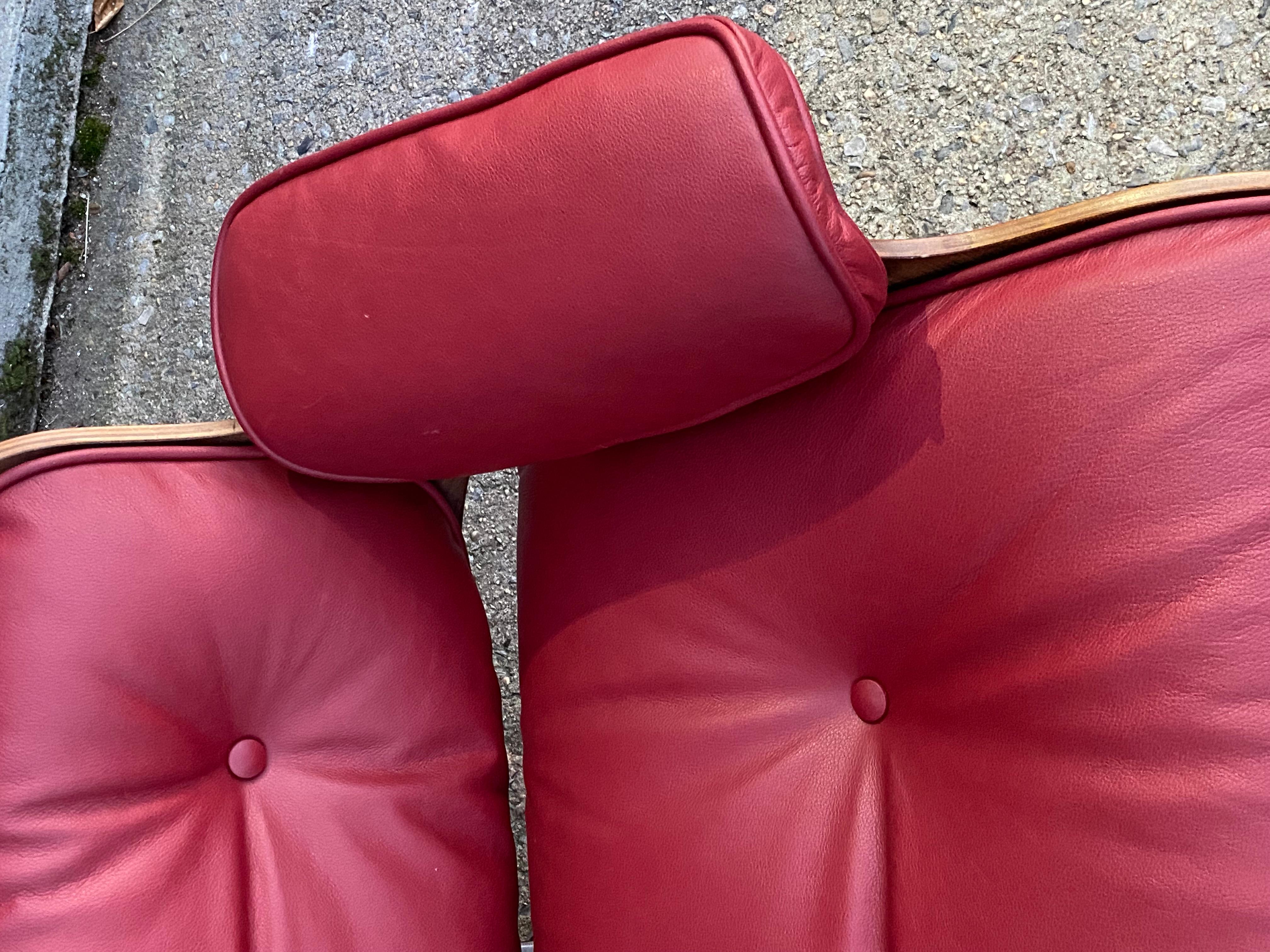 Restored Eames Lounge with New Leather in Chianti In Good Condition For Sale In Brooklyn, NY