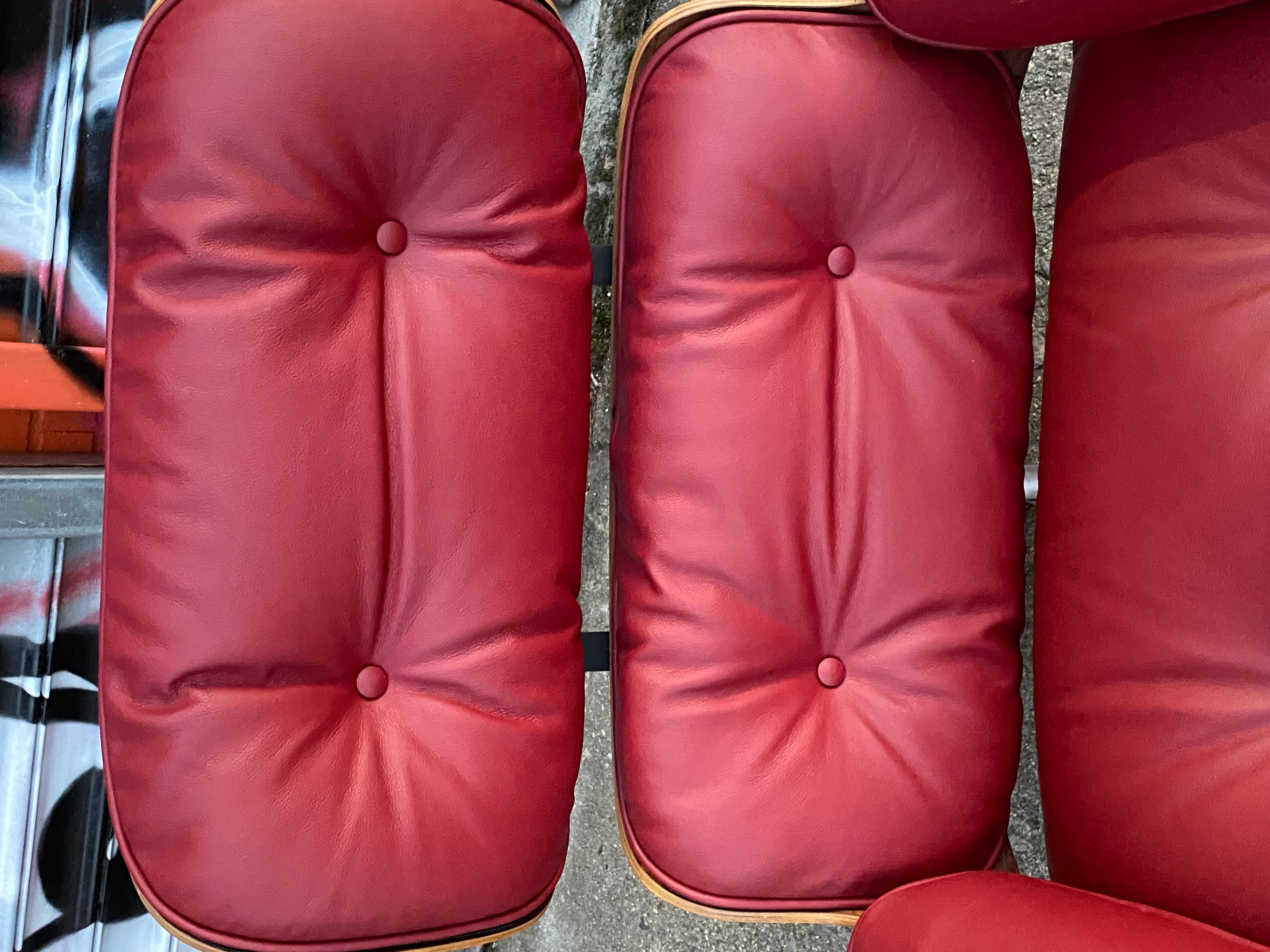 Wood Restored Eames Lounge with New Leather in Chianti For Sale