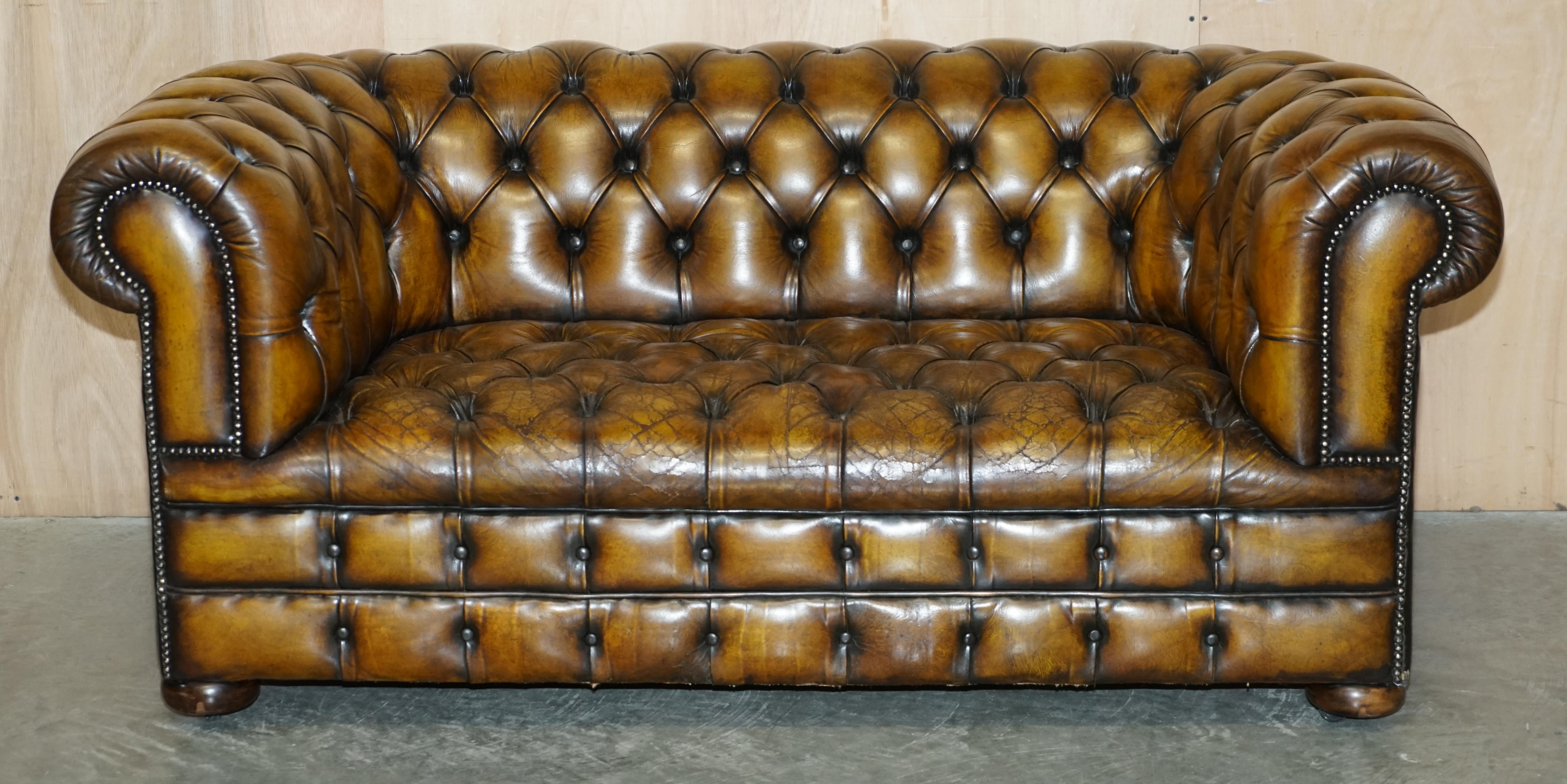 We are delighted to offer for sale this lovely original fully restored Edwardian circa 1910 aged whiskey brown leather Chesterfield sofa which is fully tufted and buttoned

What can I say, if you’re in the market for a super comfortable and highly