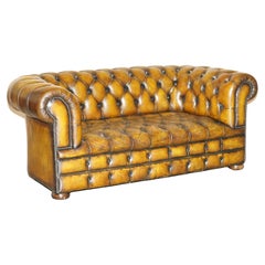 FAUTEUIL EDWARDiAN EN CUIR BRUN DE CHESTERFIELD, TUFFÉ ET BOUTONNÉ, RESTAURÉ