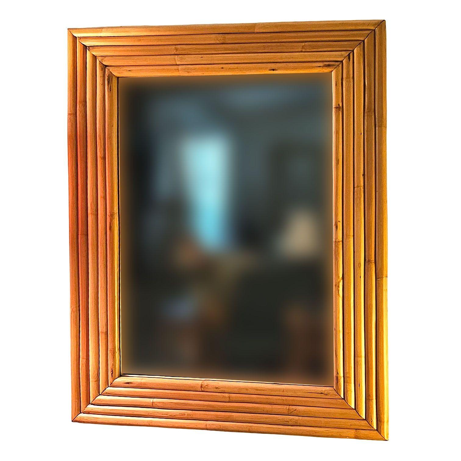 This beautifully restored 1948 new-stock rattan frame from the unused stock of Tropical Sun Rattan Company of Pasadena blends style and vintage charm with modern comfort. The Mirror features a 5-strand stacked rattan frame with a 28