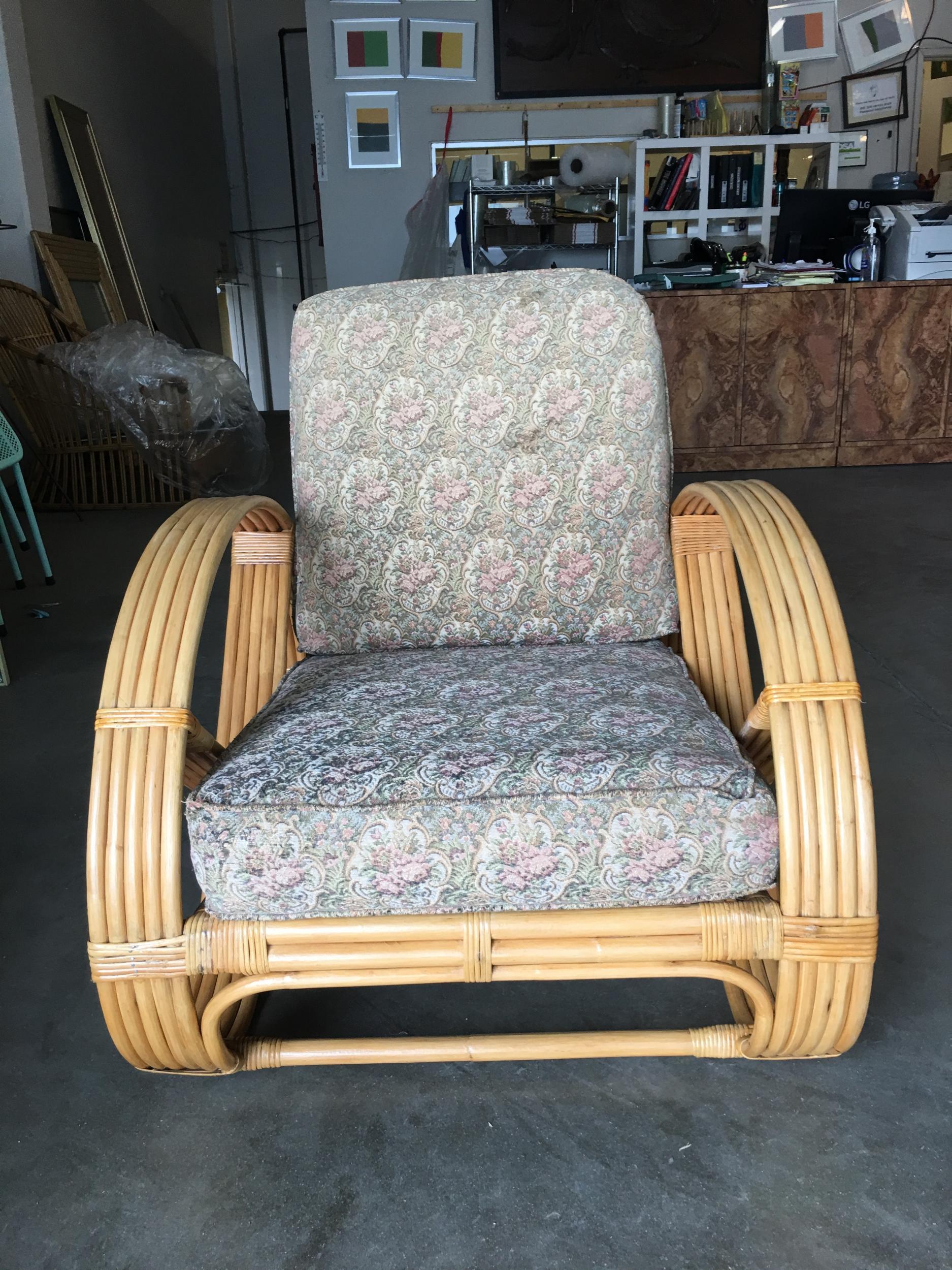 Rare five-strand round full pretzel arm rattan lounge chairs with fancy wicker wrappings.

Restored to new for you. 

This was made by Ritts co, Tropitan , Herb Sr. and Shirley Ritts. Shirley was an American interior designer, furniture designer,