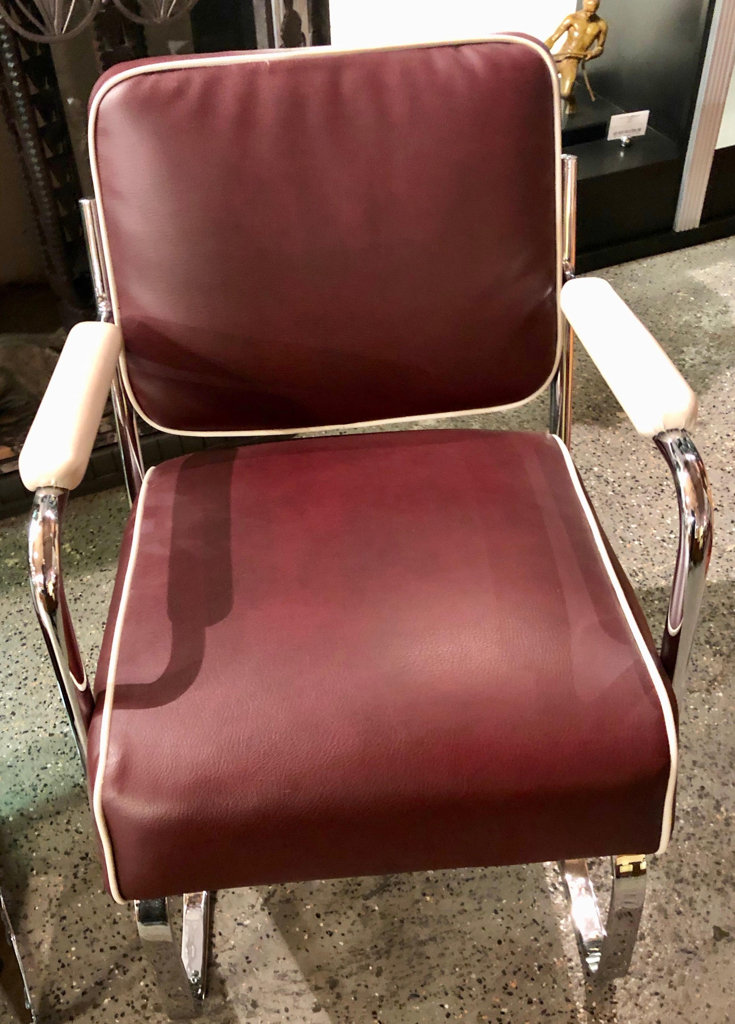 Restored flexible metal two-tone Art Deco club chairs. Fun unusual chairs with a very relaxed style. Made in USA, these Industrial style tubular machine made cantilever lounge chairs are a great addition to your Art Deco or midcentury room.