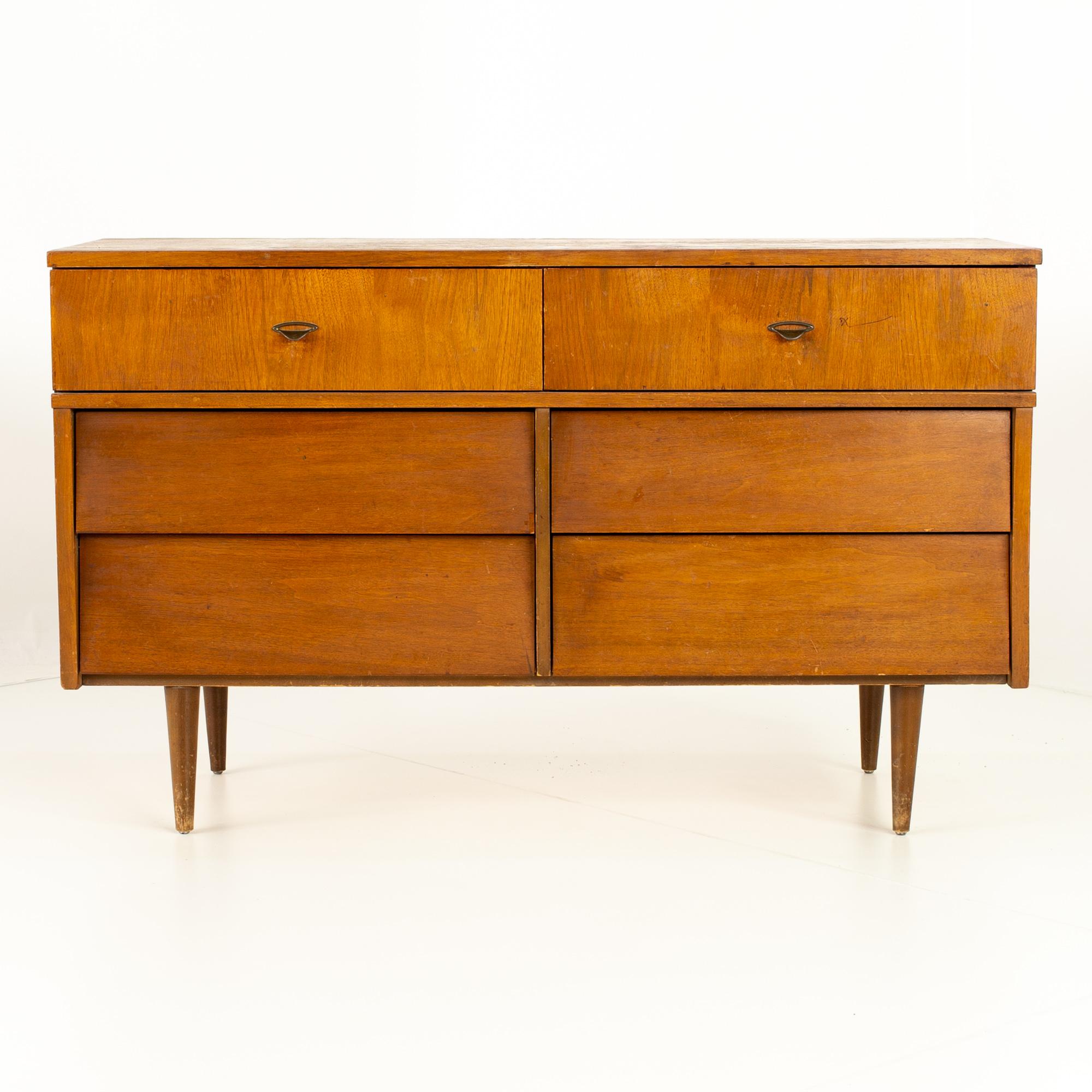 Restored Florence Knoll style Harmony House 6 drawer midcentury louvered walnut lowboy dresser
50 wide x 18 deep x 30.5 high
Restored vintage condition. Piece is restored upon purchase so it’s free of watermarks, chips or deep scratches with color
