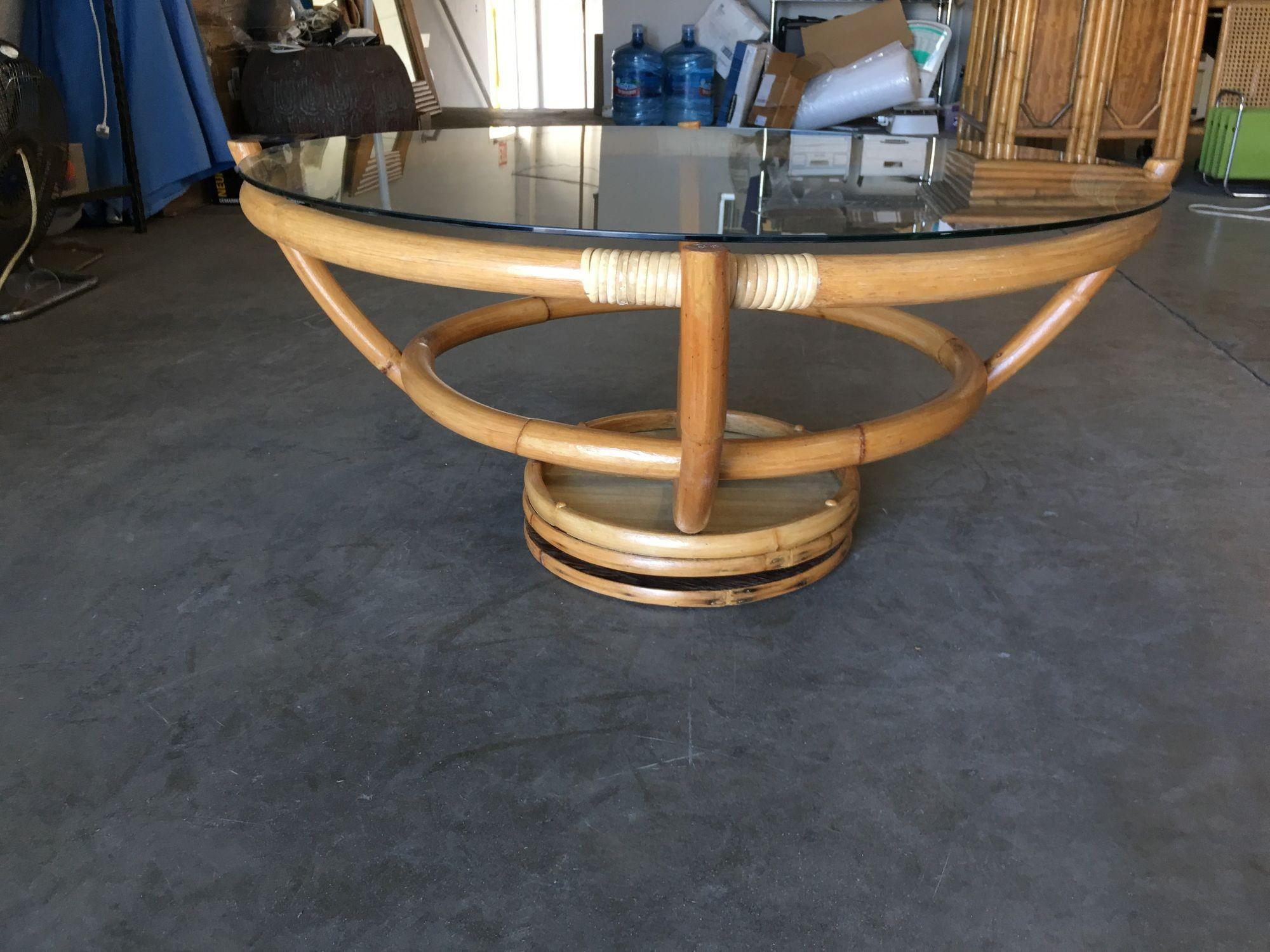 American Restored Four Pole Rattan Coffee Table with Floating Glass Top For Sale
