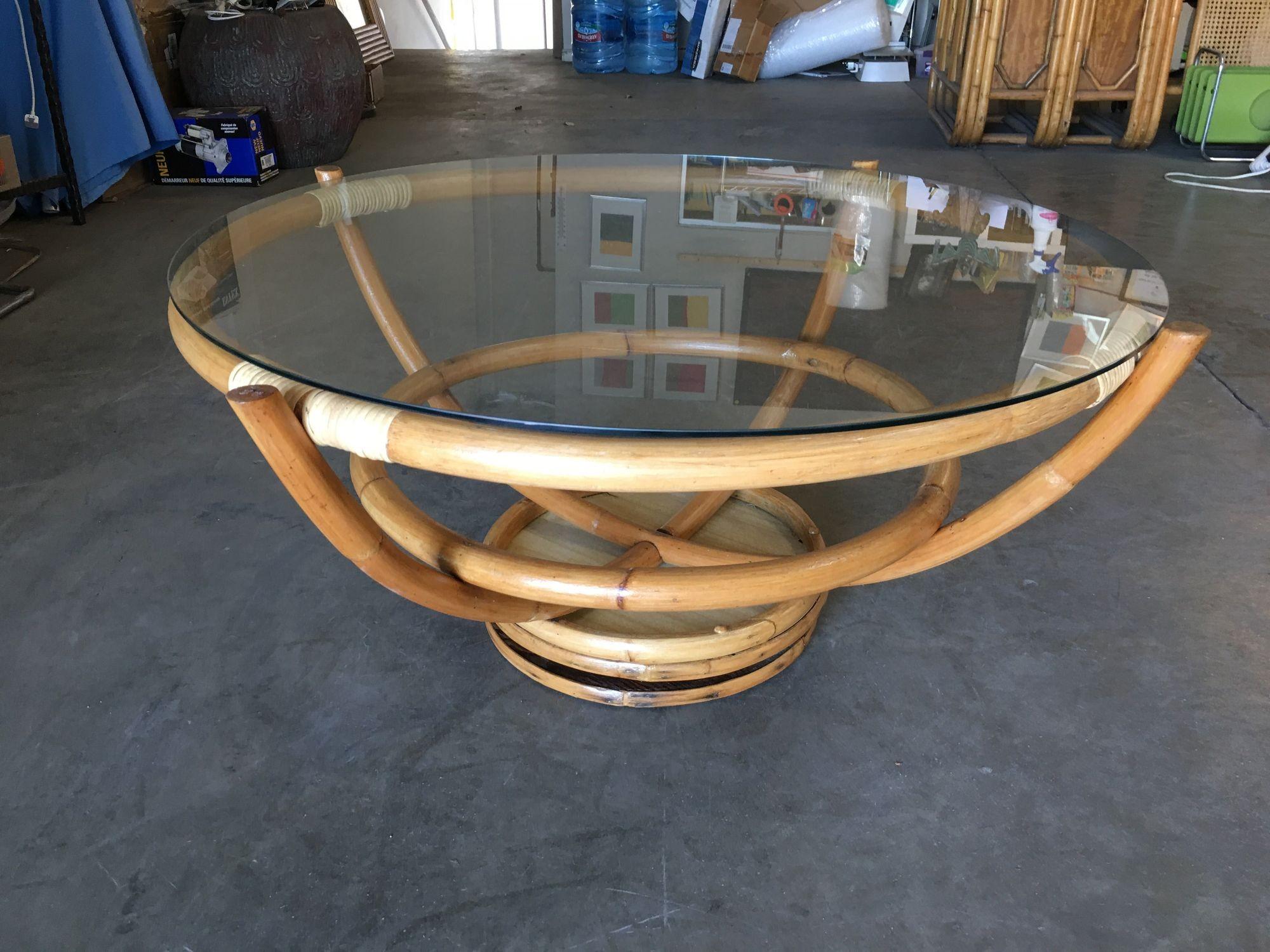 Restored Four Pole Rattan Coffee Table with Floating Glass Top In Excellent Condition For Sale In Van Nuys, CA
