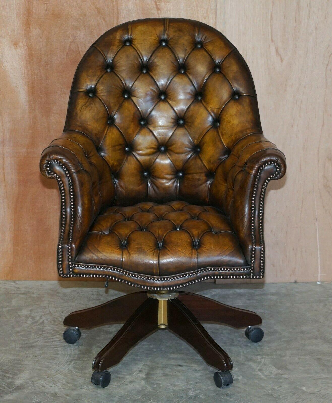 We are delighted to offer for sale this stunning fully restored aged brown leather Godfather Directors armchair

This is a very fine and well made English circa 1940’s Directors chairs, it has a coil sprung base, Chesterfield tufted all over, the