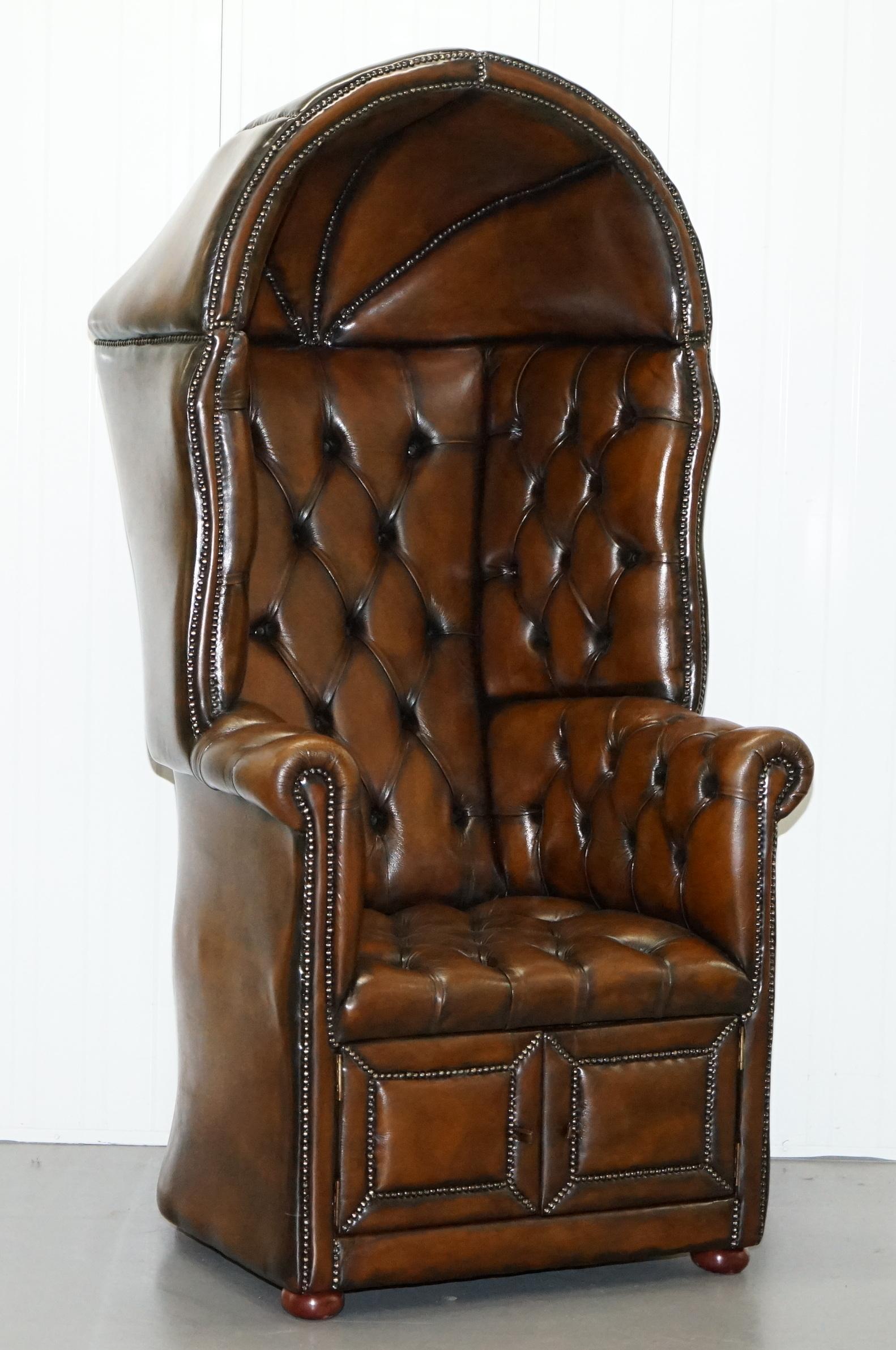 We are delighted to this stunning large fully restored hand dyed cigar brown leather Chesterfield Porters armchair

A good looking well-made and decorative armchair, the base section has a handy cupboard for storage. These chairs were originally