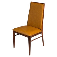Silla restaurada con respaldo alto de nogal, diseñada por Mil Baughman para Dillingham, EE. UU., hacia la década de 1960