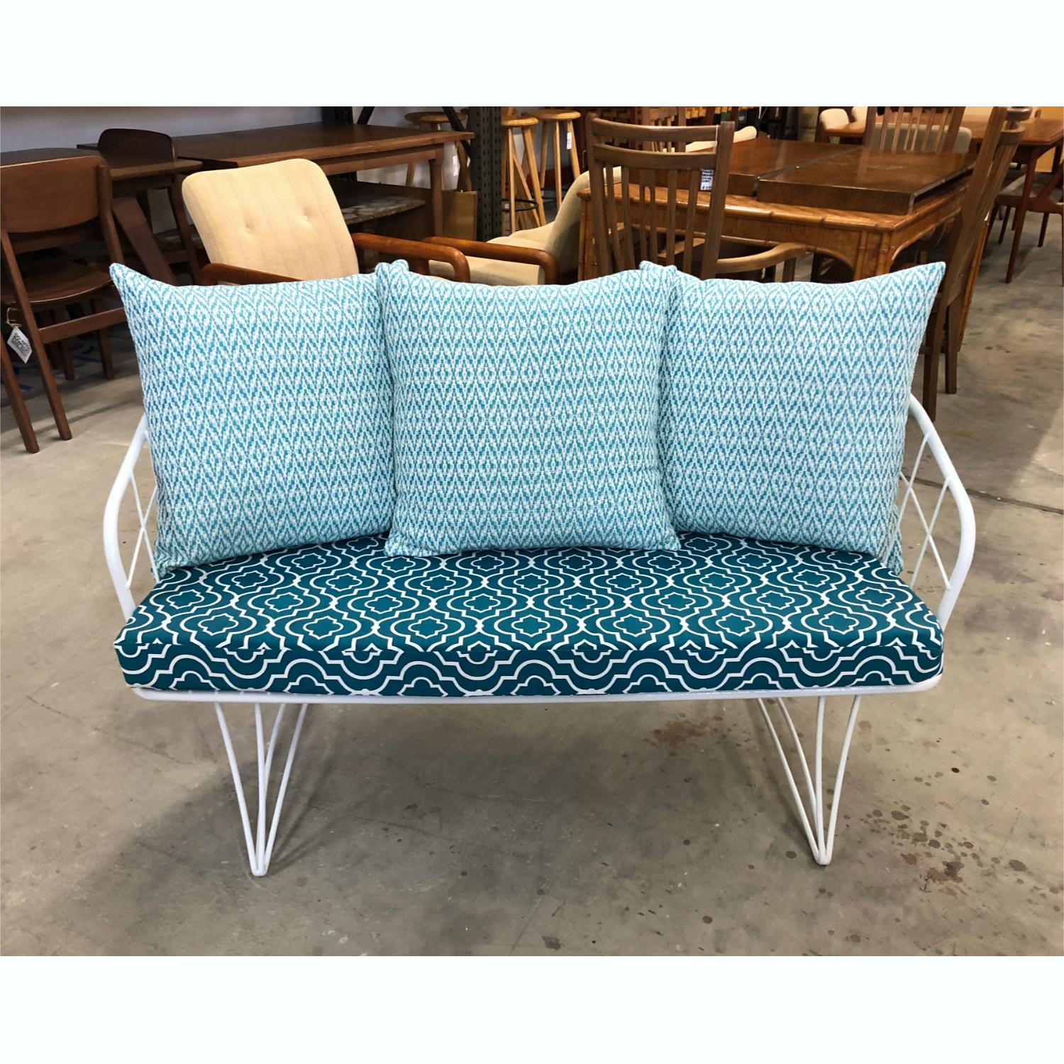 Completely restored Mid-Century Modern outdoor loveseat by Homecrest. This two-person sofa features all new white enamel paint, new cushion foam and new upholstery. The cushions have been custom created with a novel modern, yet coastal look. The