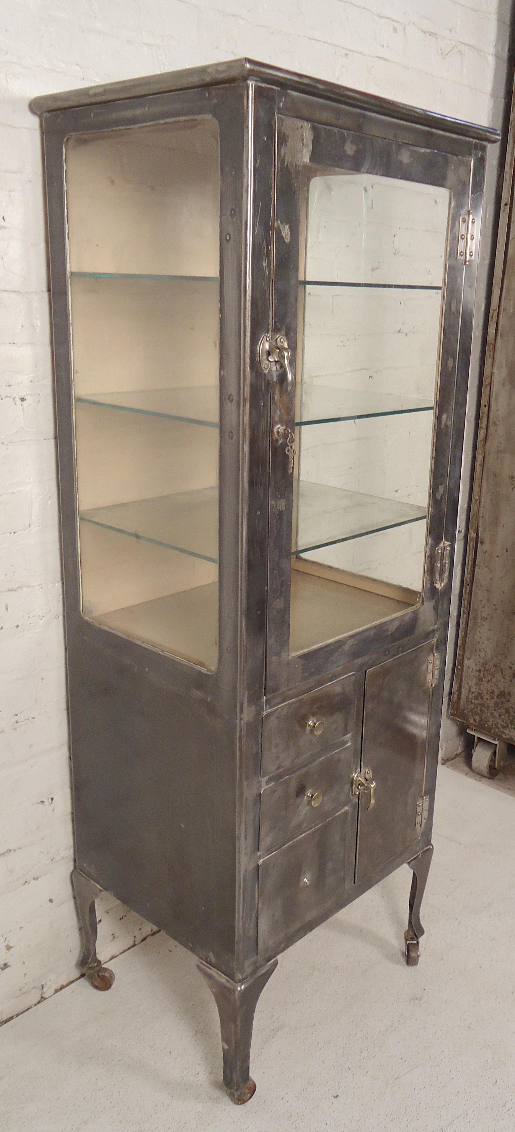 Antique dental cabinet refinished in a bare metal style finish. Great modern storage or display case.

(Please confirm item location - NY or NJ - with dealer).
 