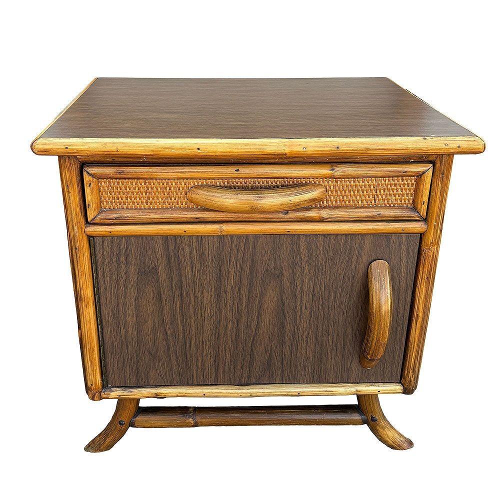 Pair of James Mont styled Mid-century rattan nightstands with woven sides and Formica tops each featuring rattan pulls and an arched rattan base. Each comes with a center drawer and a small cabinet underneath.

Measurements: H 23