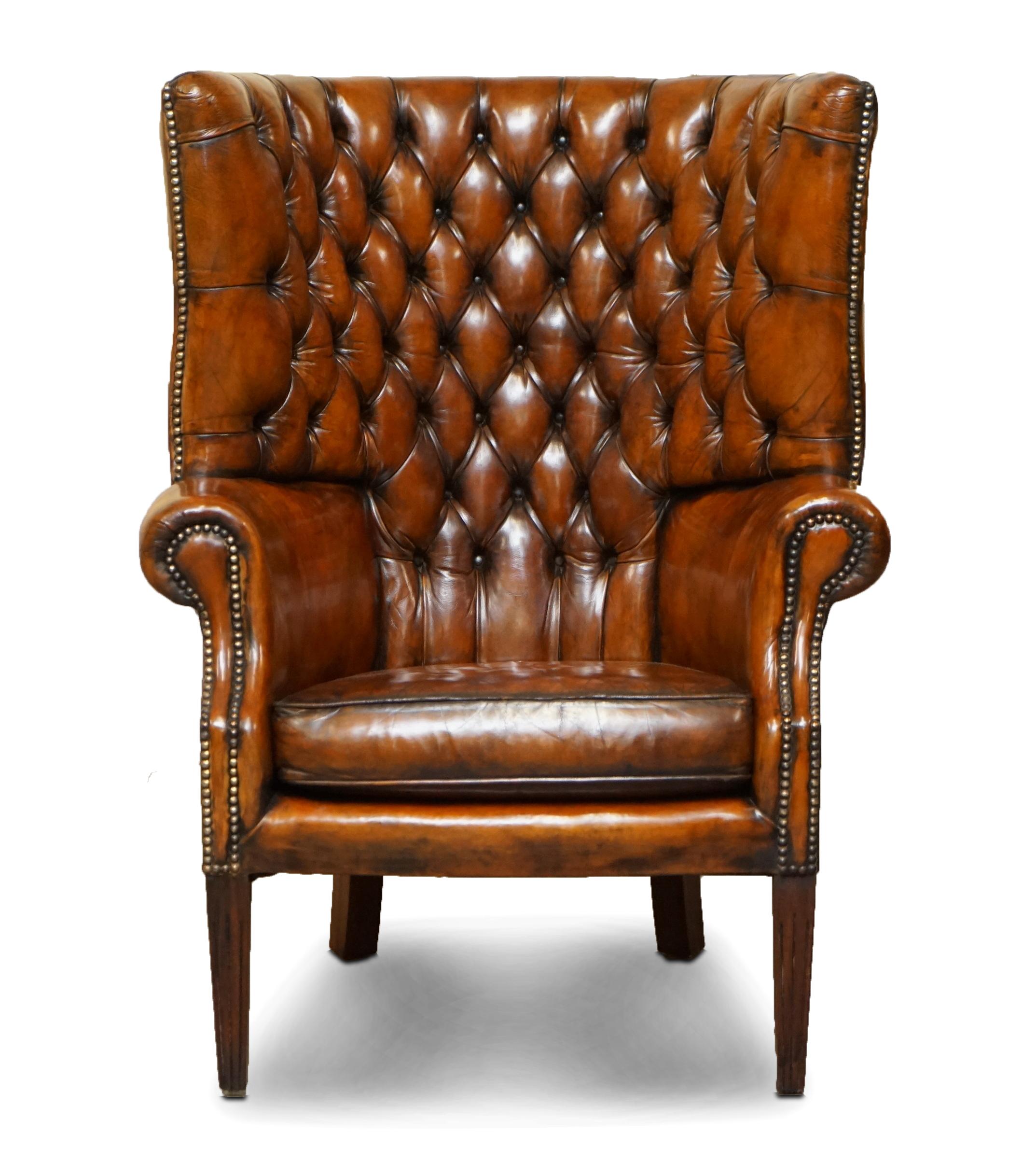 We are delighted to offer for sale this stunning late Victorian Porters barrel back armchair in whisky brown leather 

This chair a real tour de force, is has absolutely everything going for it, the leather hide is original and hand dyed from new,