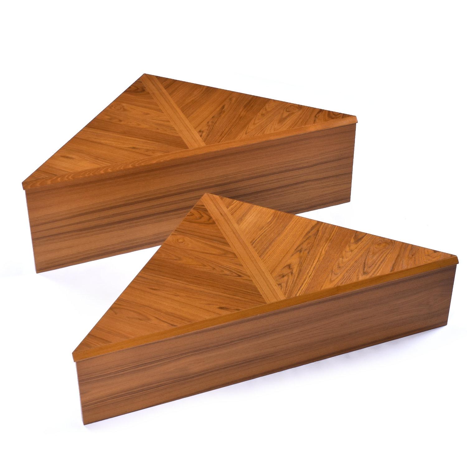 Pair of refinished Danish teak modular table set by Laurits M Larsen. These triangular tables are super versatile! Join them in any orientation to create a coffee table. The pieces are large enough to use independently as a coffee table and the or
