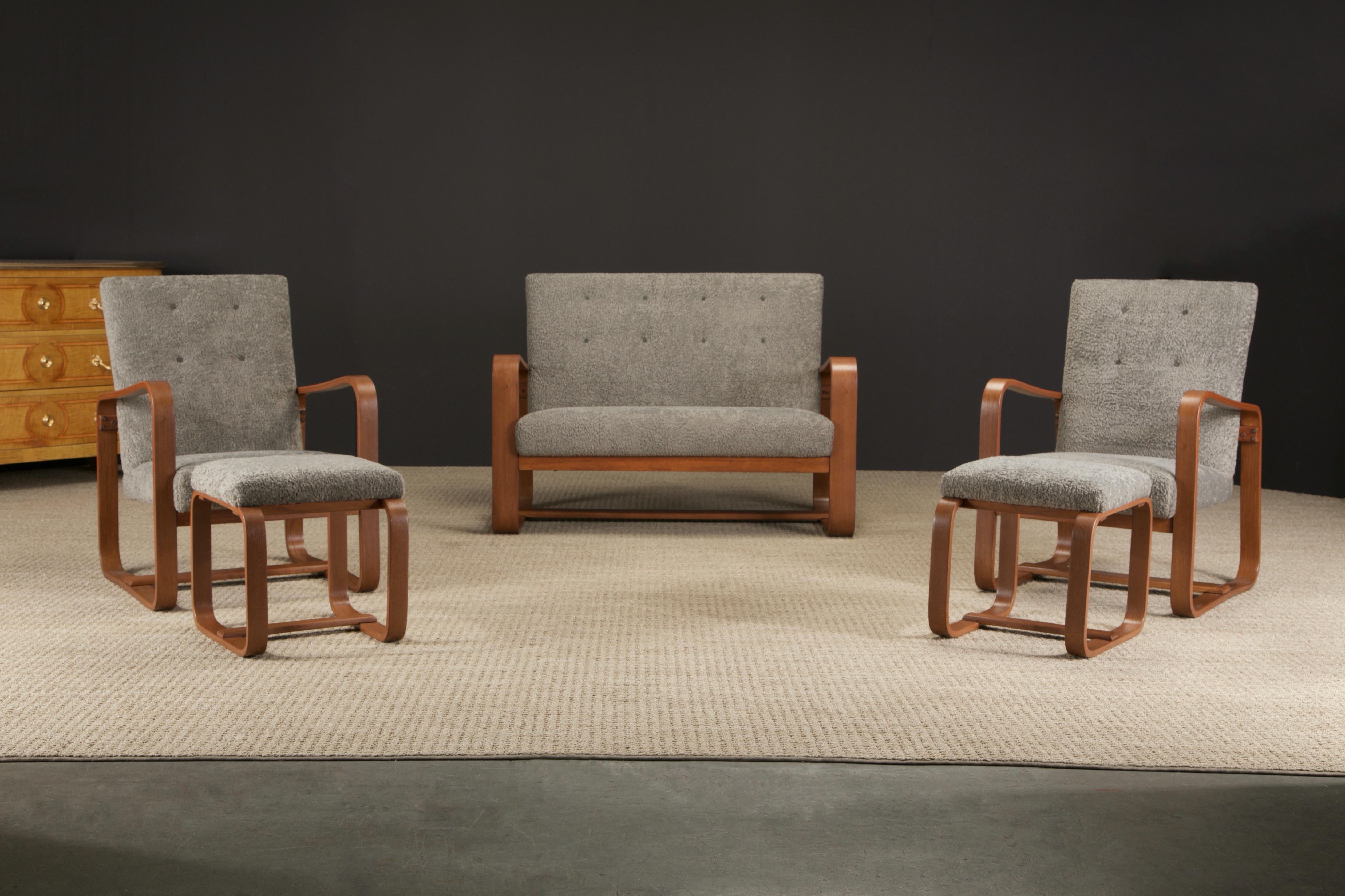 This rare five-piece (5) living room suite by Giuseppi Pagano, designed in 1939 for Bocconi University in Milan, is comprised of two oak bentwood upholstered open armchairs with ottomans and a settee. 

This set was recently restored, the oak