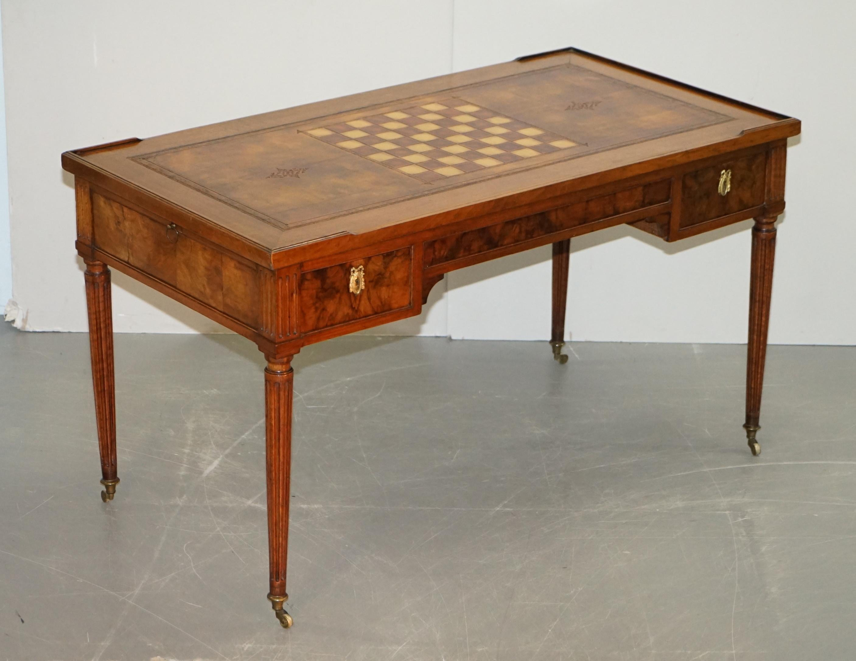 We are delighted to offer for sale this absolutely sublime fully restored one of a kind Louis XVI circa 1780 period Tric Trac games table in Walnut, Hardwood and brown leather

An image of Marie-Antoinette’s games room, the ‘Salon de la Paix’ at