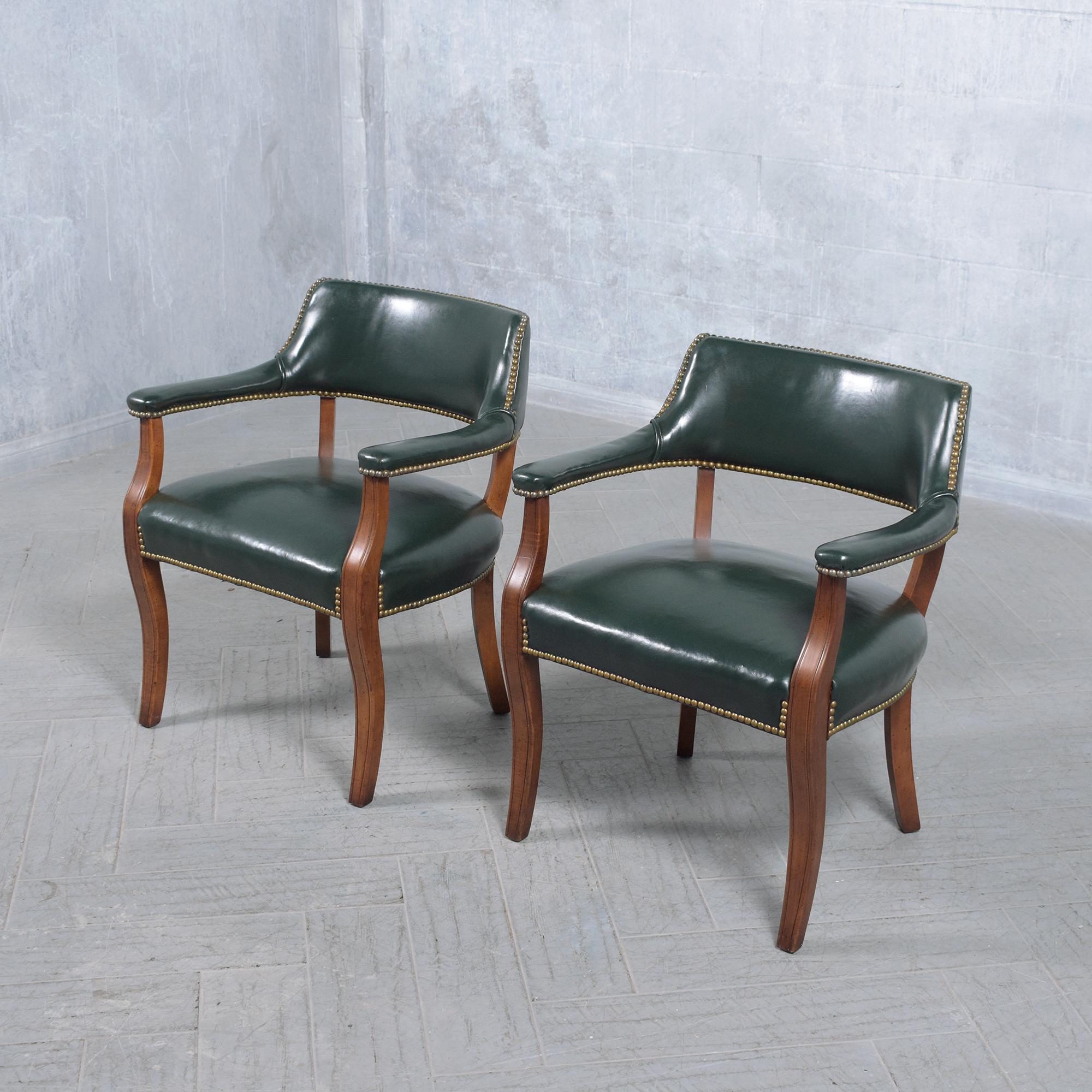 Mid-20th Century Classic Elegance: Set of 4 Mahogany Barrel Armchairs with Emerald Leather For Sale