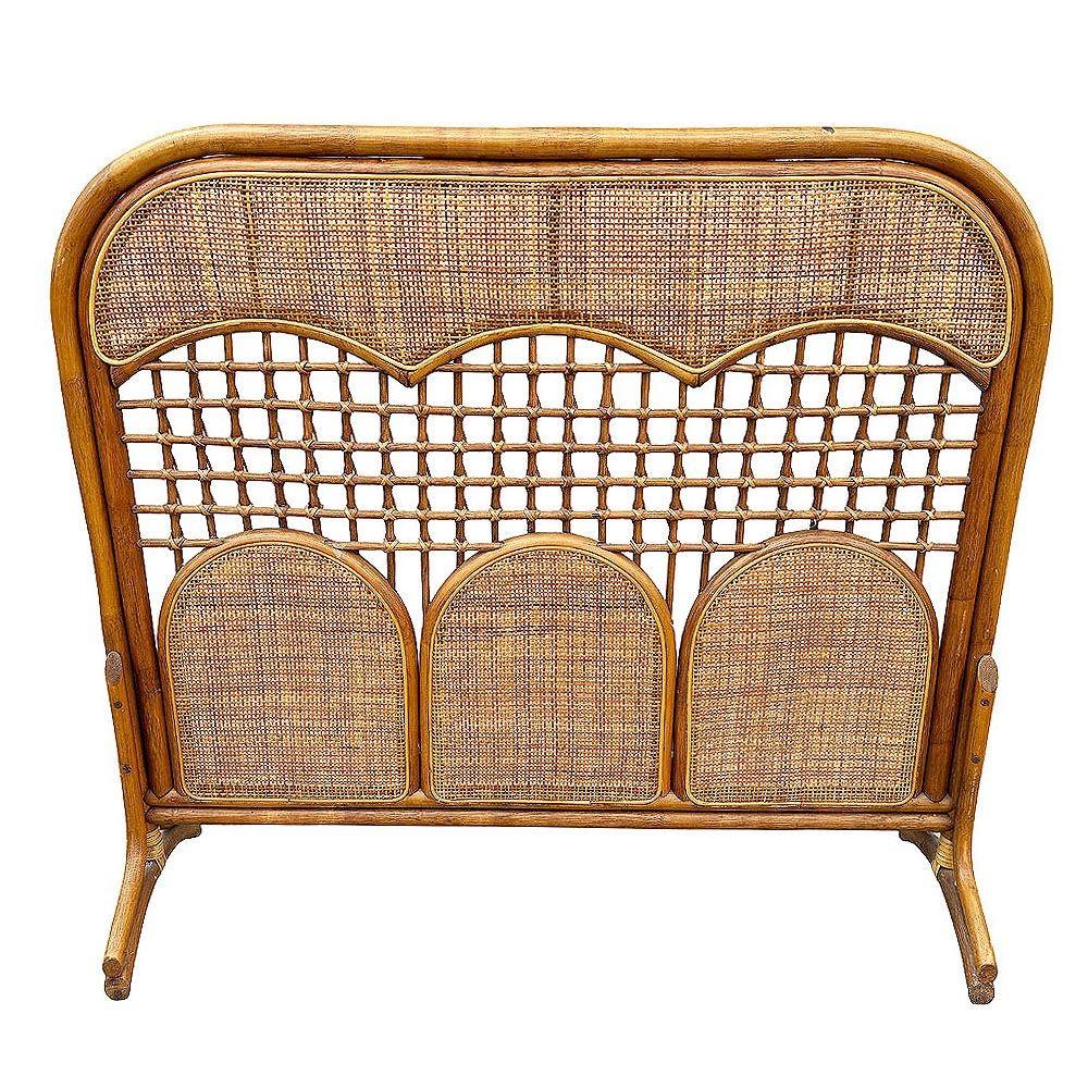 The original restored vintage rattan fireplace screen is handcrafted with intricate wicker weaving around an arched rattan frame, blends timeless charm with Mid-century modernist design.

It reflects quality craftsmanship, making it a perfect