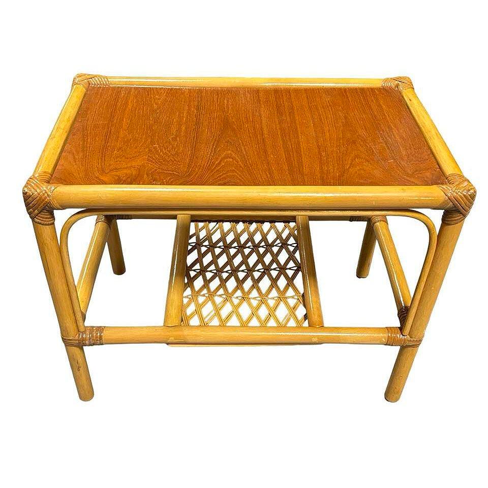 This beautifully restored Paul Frankl-inspired Mid-century era rattan coffee table with bentwood arched base and dark stained mahogany top. The table features a single under-shelf with a wicker woven bottom shelf and fancy wicker wrappings along the