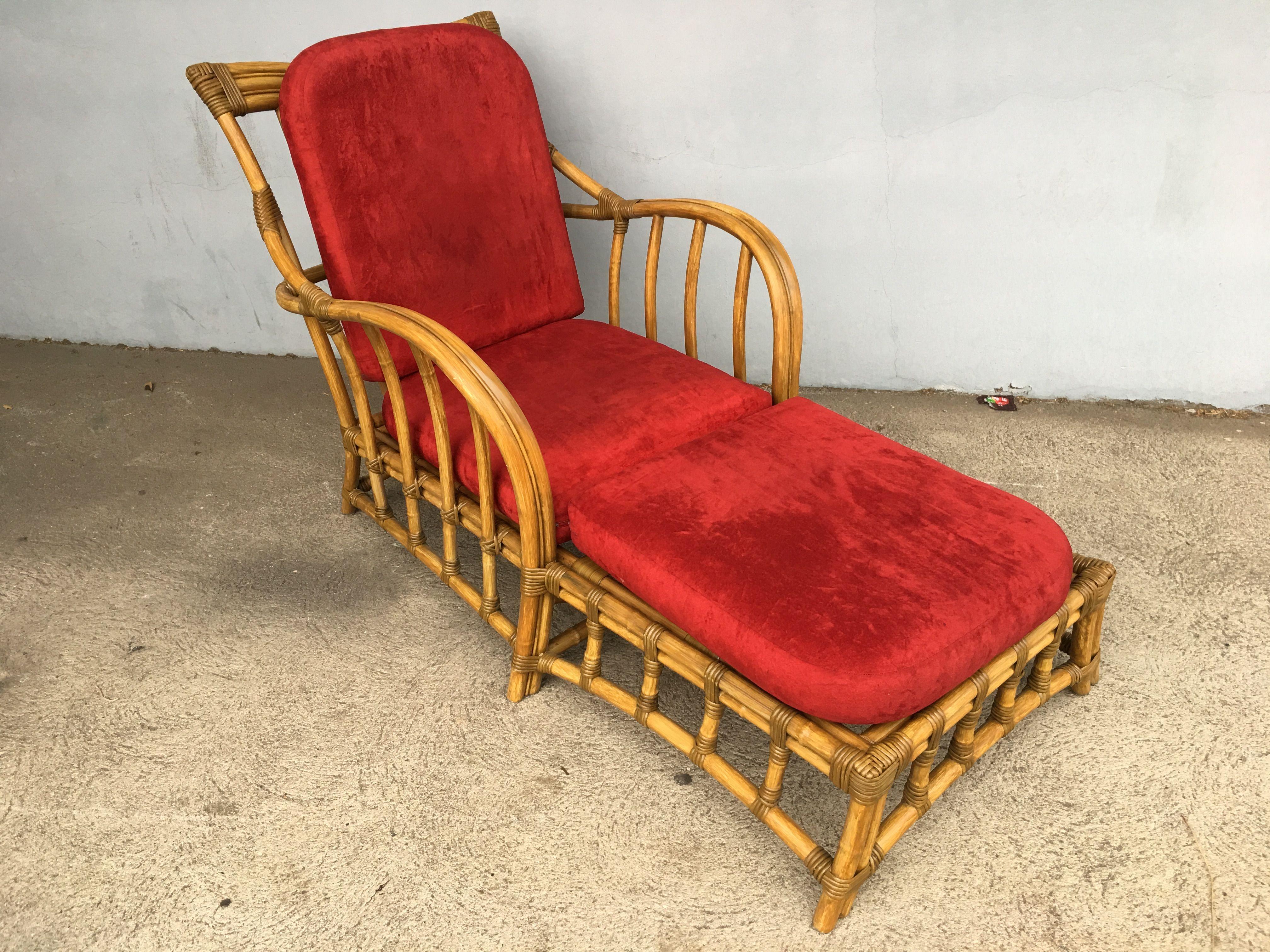 Designed in the manner of Paul Frankl, this restored rattan looking outdoor lounge chair features arched arms with a built-in footrest. 

Cushions can be C.O.M. at a small additional fee. Restored to new for you. All rattan, bamboo and wicker
