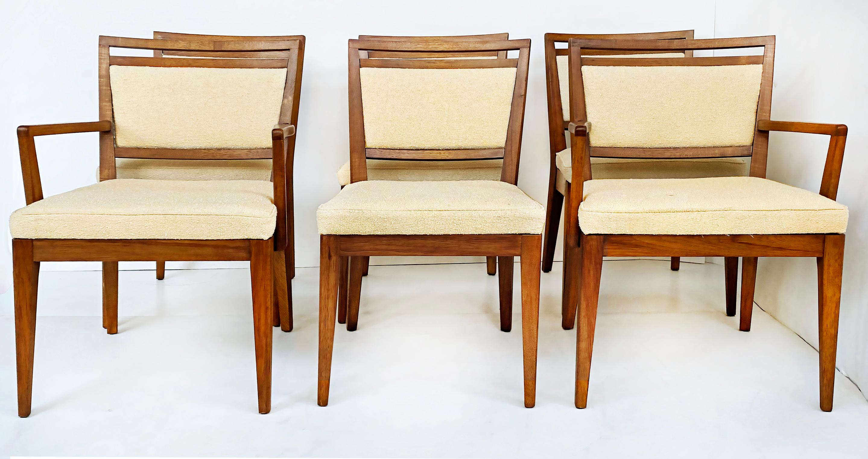 Restored Mid-Century Modern mahogany dining chairs, 1950s set of 6

Offered for sale is a newly upholstered and refinished set of 6 Mid-century Modern mahogany dining chairs that are attributed to the Modernage Furniture Company. This circa 1950s