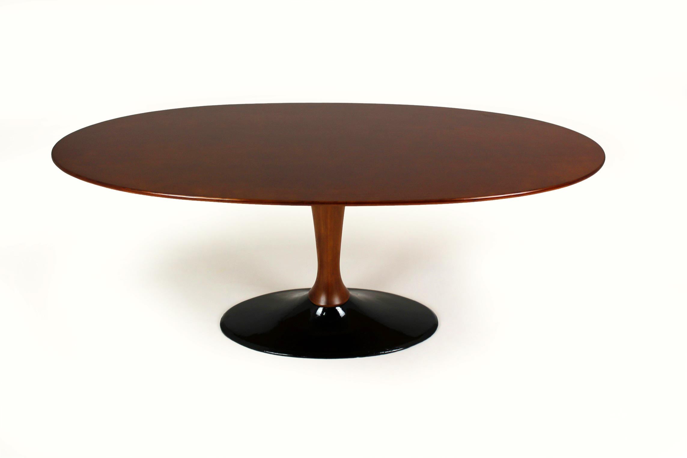 
This ash coffee table was manufactured by Drevotvar in the Czech Republic in the 1960s/1970s. The table top is supported on a turned leg, attached to a heavy steel base. The table has been renovated, lacquered with a satin finish.