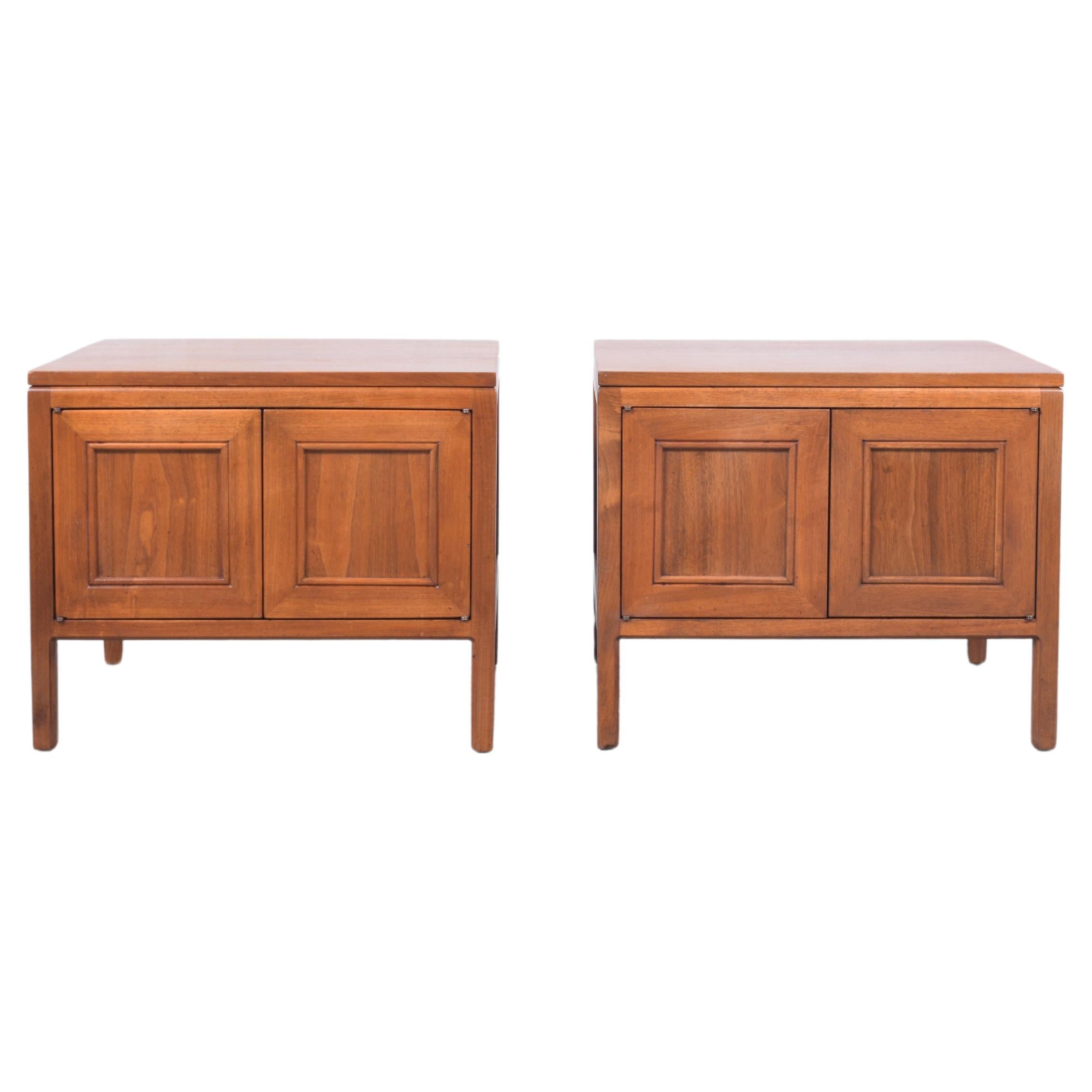 Discover the refined elegance of our mid-century modern nightstands, beautifully restored and refinished by our expert craftsmen. Crafted from high-quality walnut wood, these bedside tables boast a light brown stain enhanced by a durable lacquer