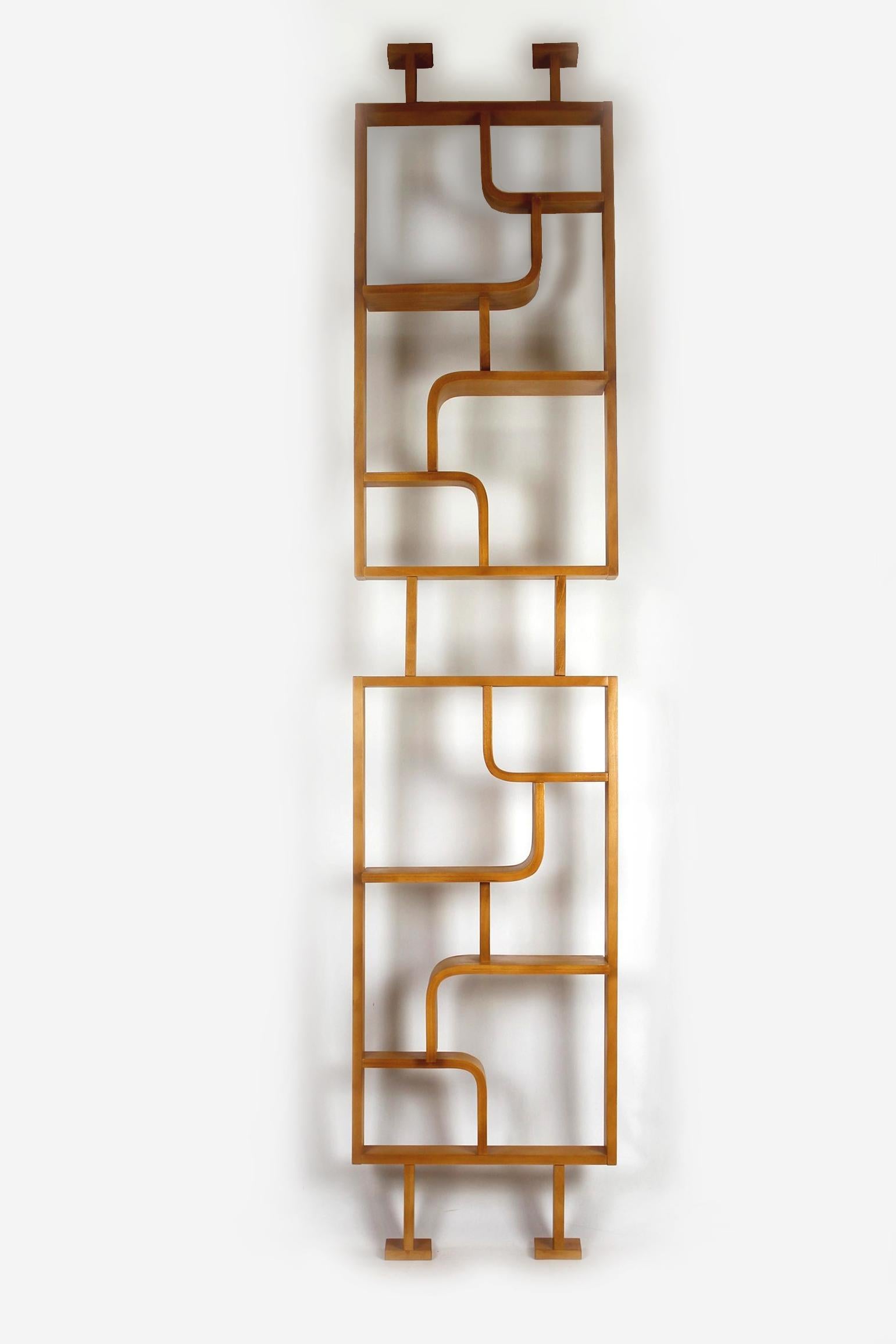 This room divider was designed by Ludvik Volák for Dřevopodnik Holešov in the 1960s.
Made of bent, veneered plywood. This room divider has been completely restored, varnished in a satin finish.

