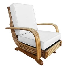 Silla mecedora Springer de ratán de triple hebra de mediados de siglo restaurada