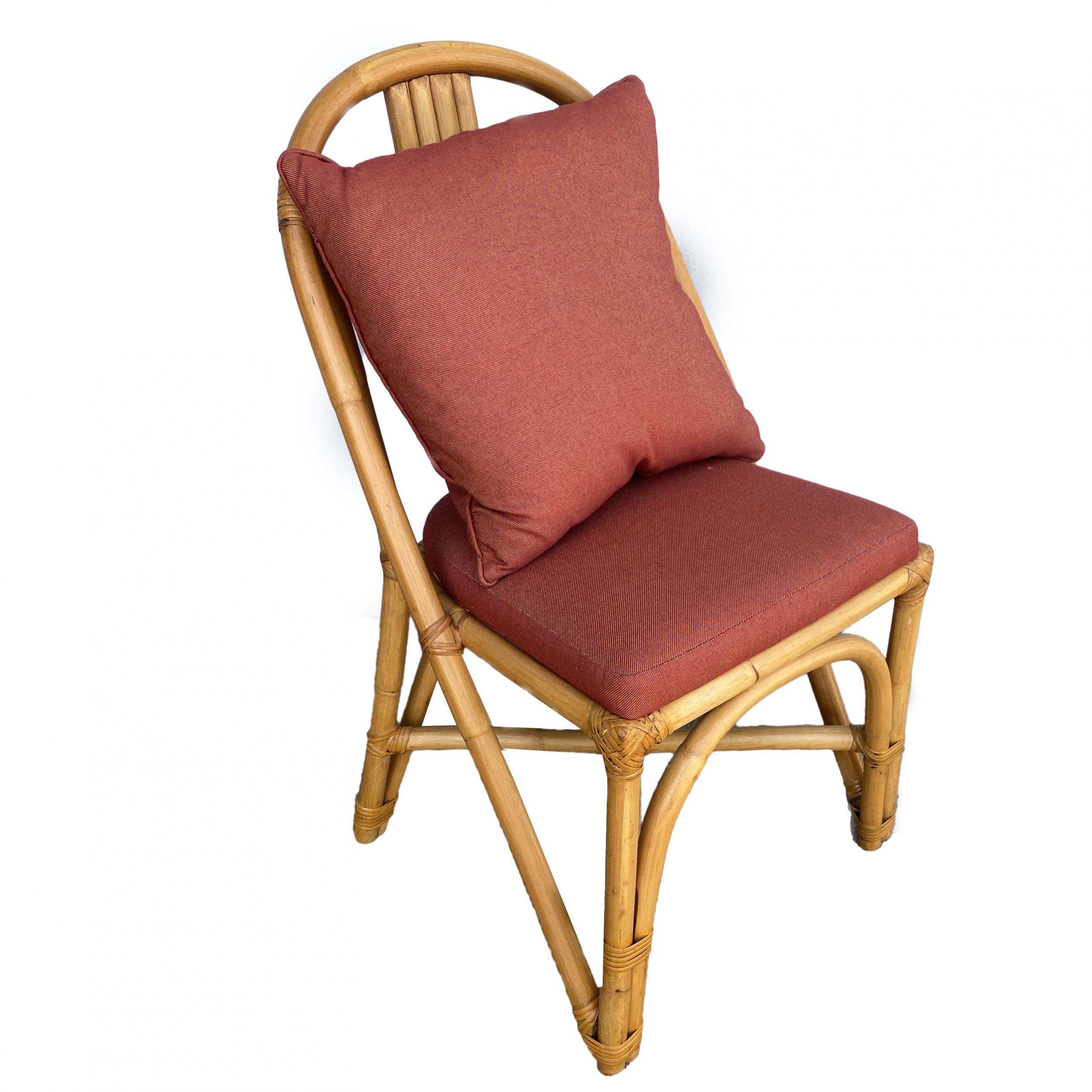 Vintage rattan dining room side chair with red padded seat, included is a set of fix chairs. Each chair features a pole rattan frame back with red upholstery seat and pillow style back seat.

Cushions made to order included. The cushions pictured