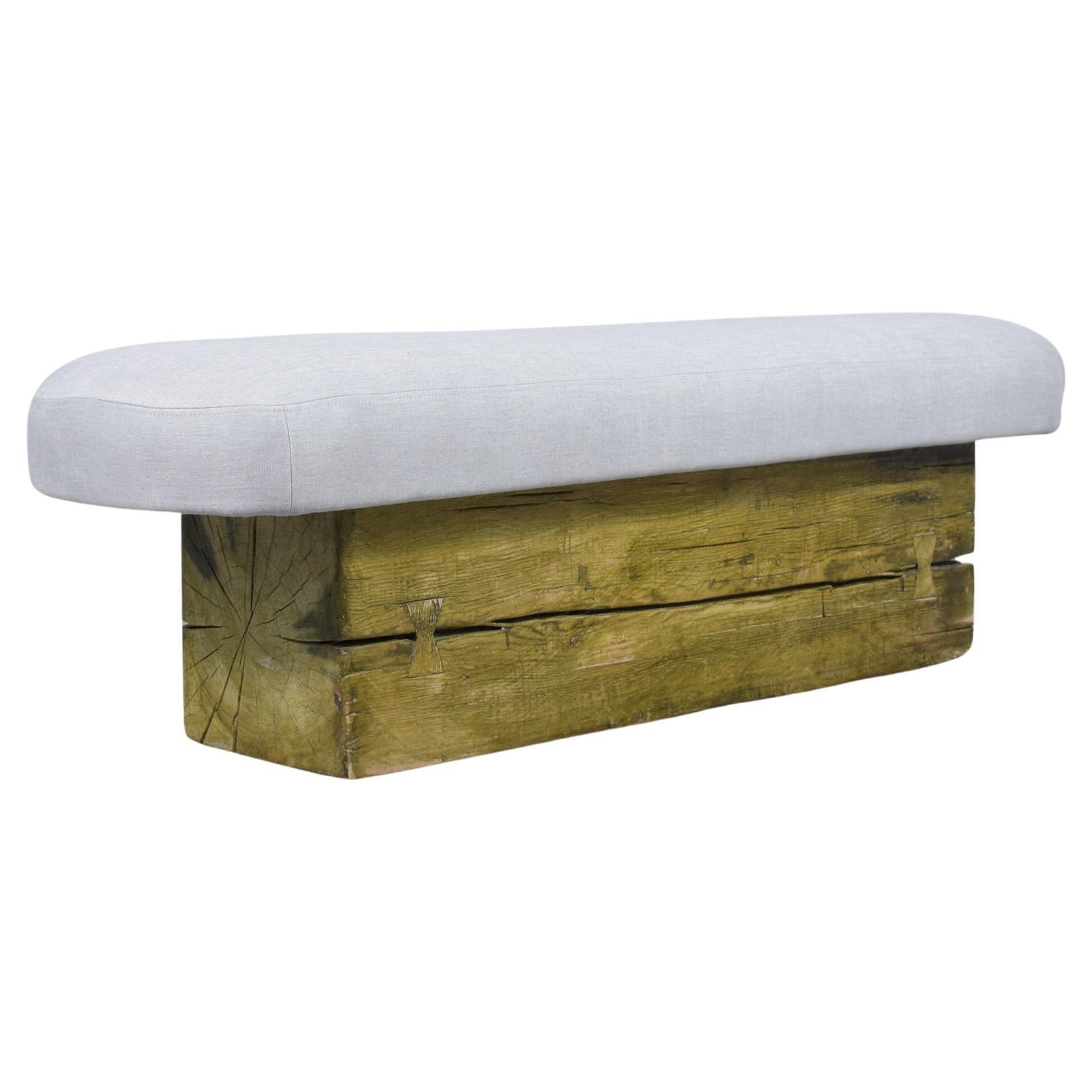 Elevate your interior with our beautifully restored modern slab bench, a testament to the perfect blend of contemporary design and classic craftsmanship. Expertly constructed from solid wood, this bench not only showcases the finesse of artisanal