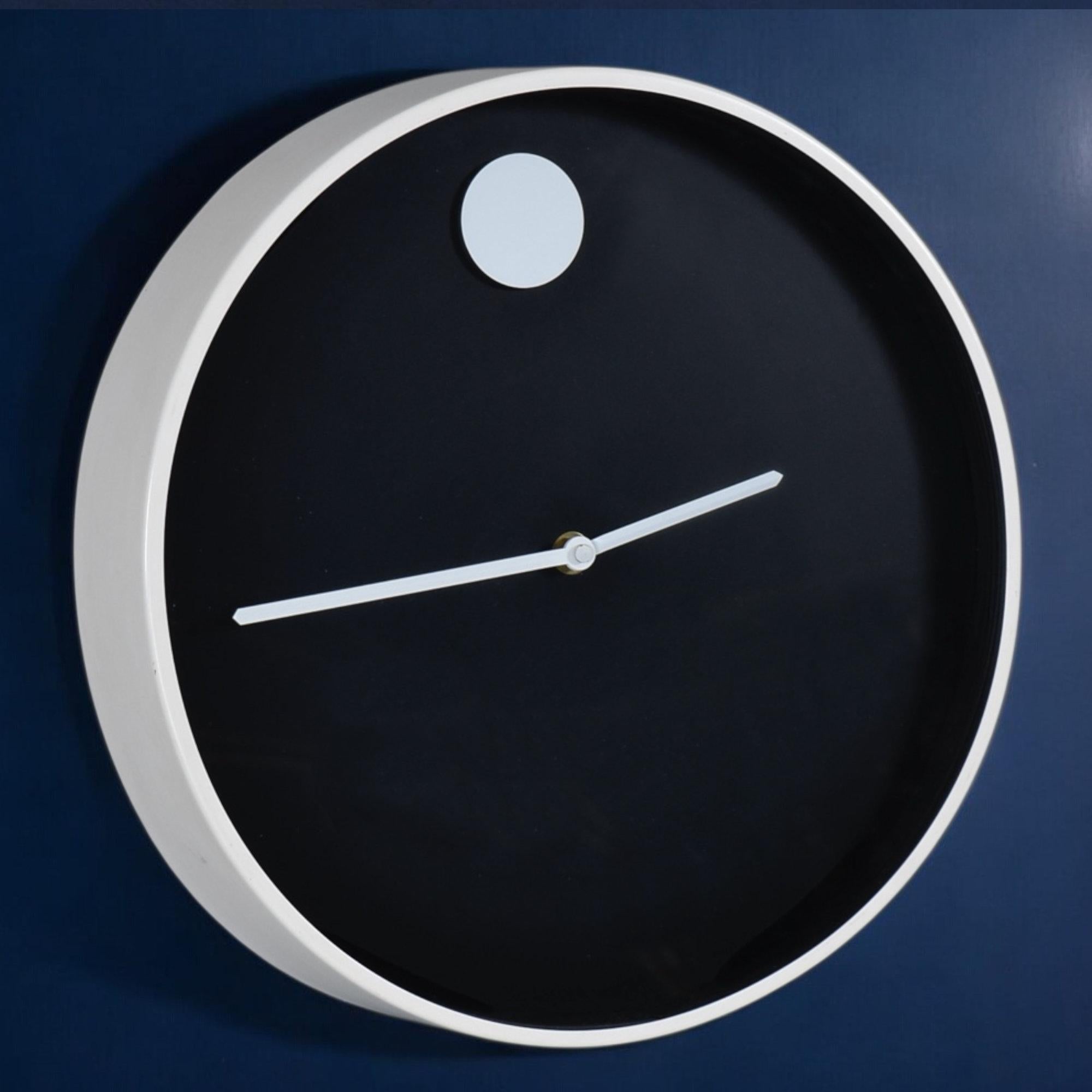This beautiful, fully restored Museum Wall Clock is a striking example of mid-century modern minimalism at its finest. Designed by the visionary Nathan George Horwitt and produced by the Howard Miller Clock Company in the early 1970s, this clock is
