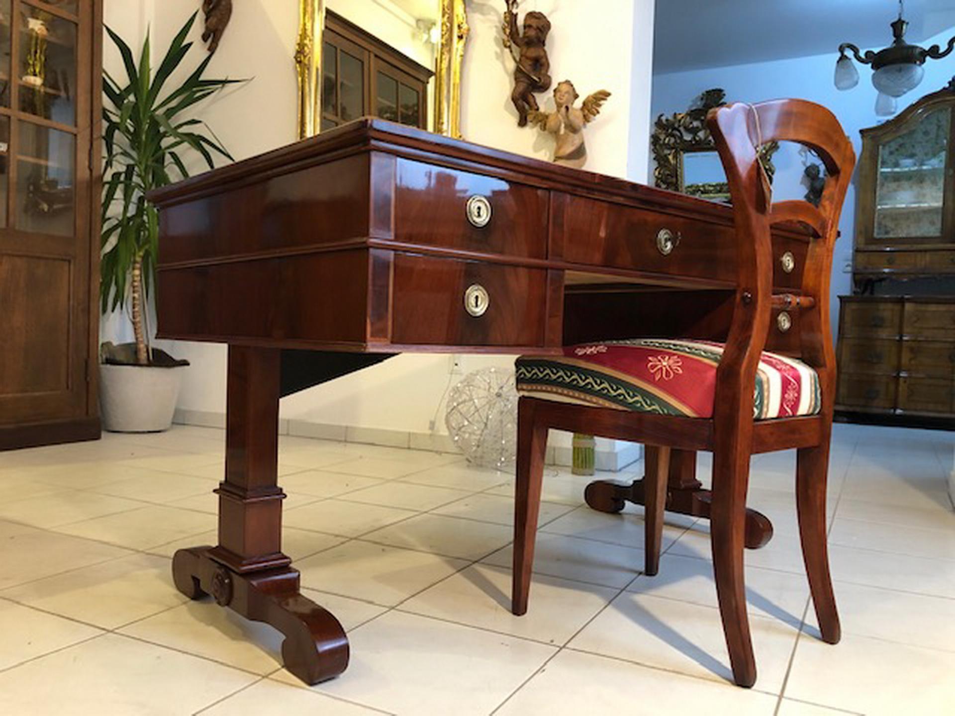 Nice desk from the time of the Biedermeier, circa 1865.This is a beautiful restored hardwood item with very beautiful ornamentations. Manufactured, circa 1865.This desk is an eye-catcher in your study or office, equipped with five drawers. The desk