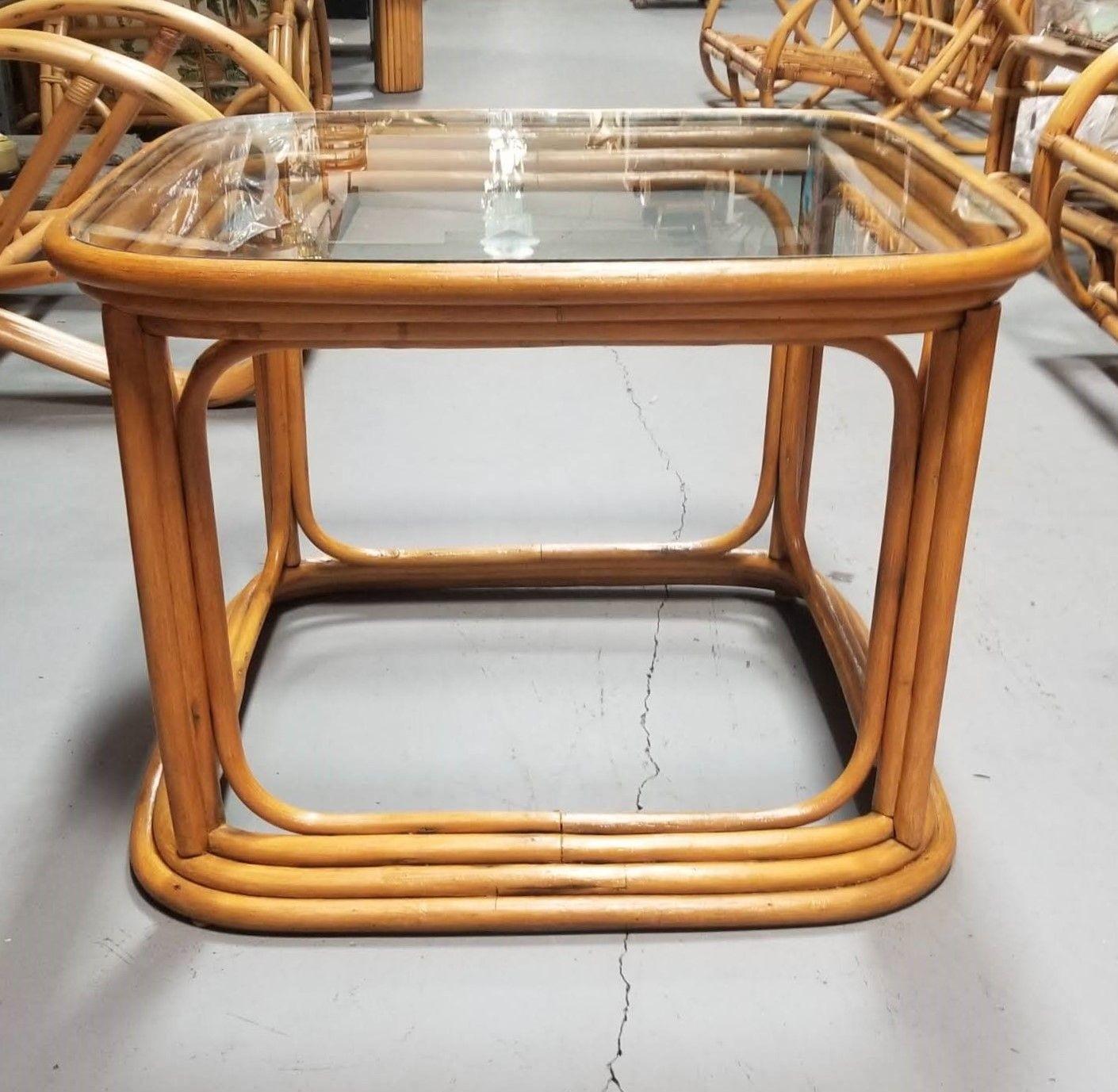 Restored 4-strand rattan legs coffee table with glass tops.

Circa 1950, United States 

We only purchase and sell only the best and finest rattan furniture made by the best and most well-known American designers and manufacturers including:

Ritts