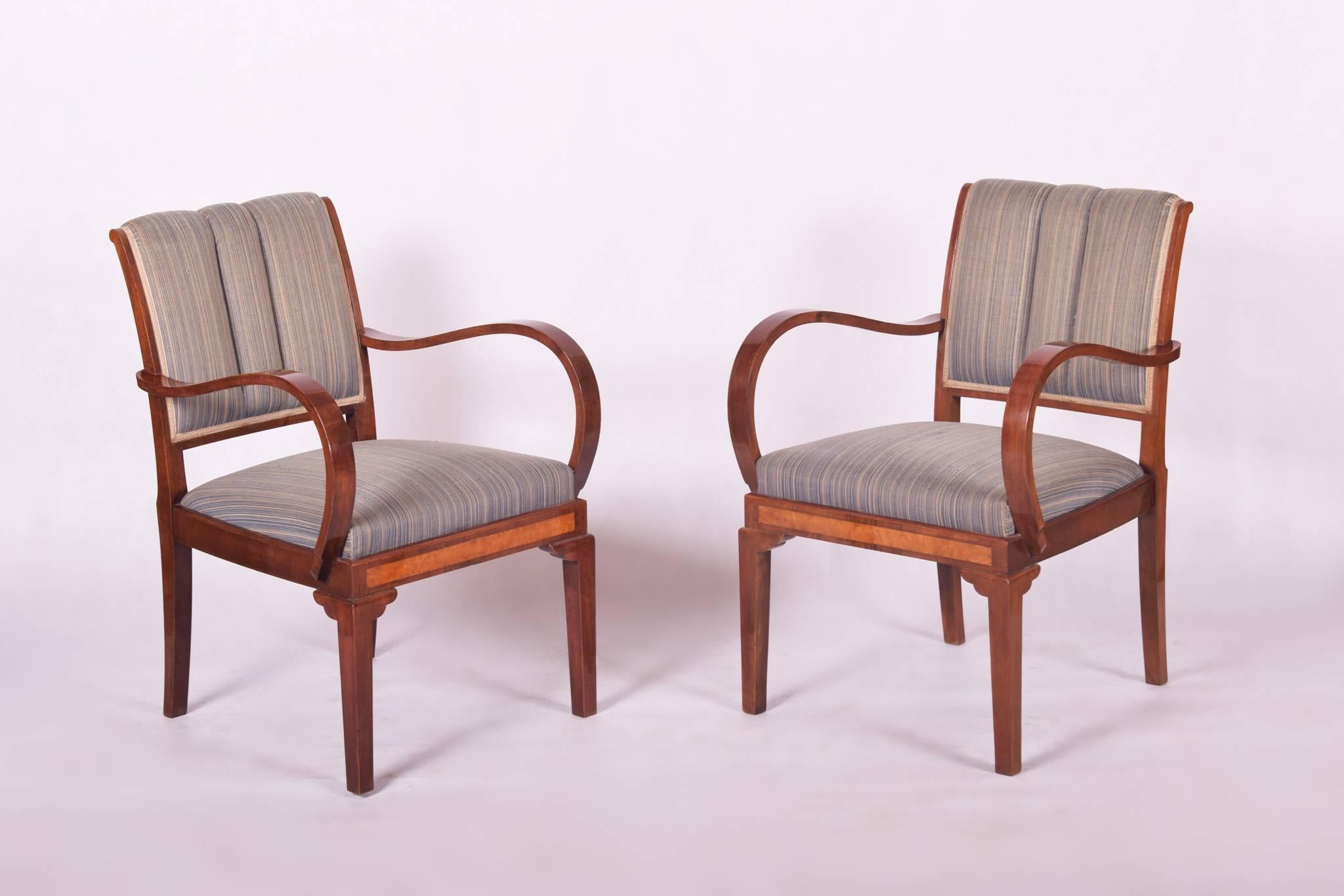 Pair of Art Deco armchairs.
Completely restored, surface made by shellac polish.
Material: Combination of walnut and maple
Well-preserved original upholstery.

We guarantee safe a the cheapest air transport from Europe to the whole world within 7
