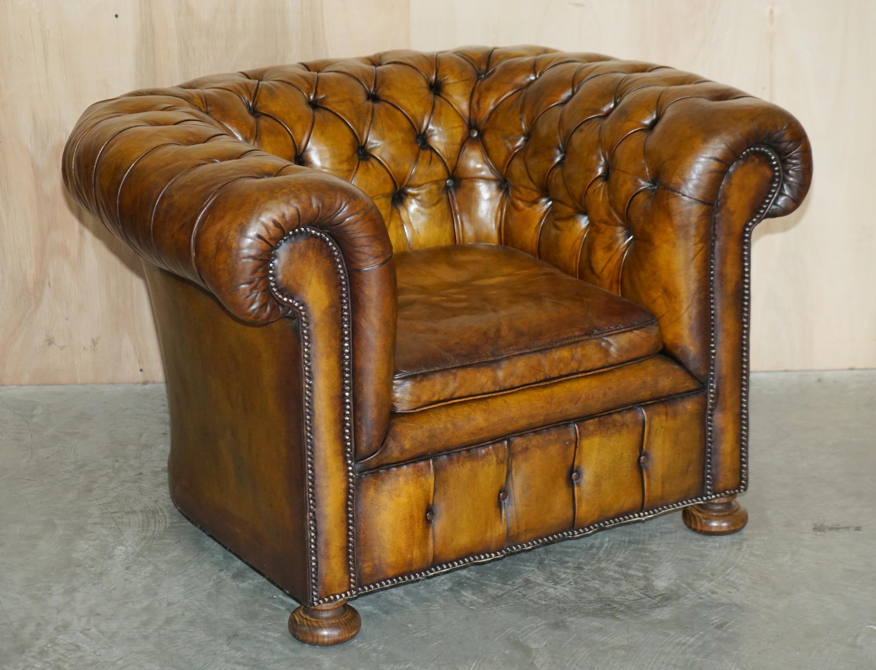 We are delighted to offer for sale this lovely original pair of circa 1900s fully restored hand dyed Whiskey brown leather Chesterfield fully buttoned club armchairs

A good looking and iconic pair of English club armchairs. Known the world over as