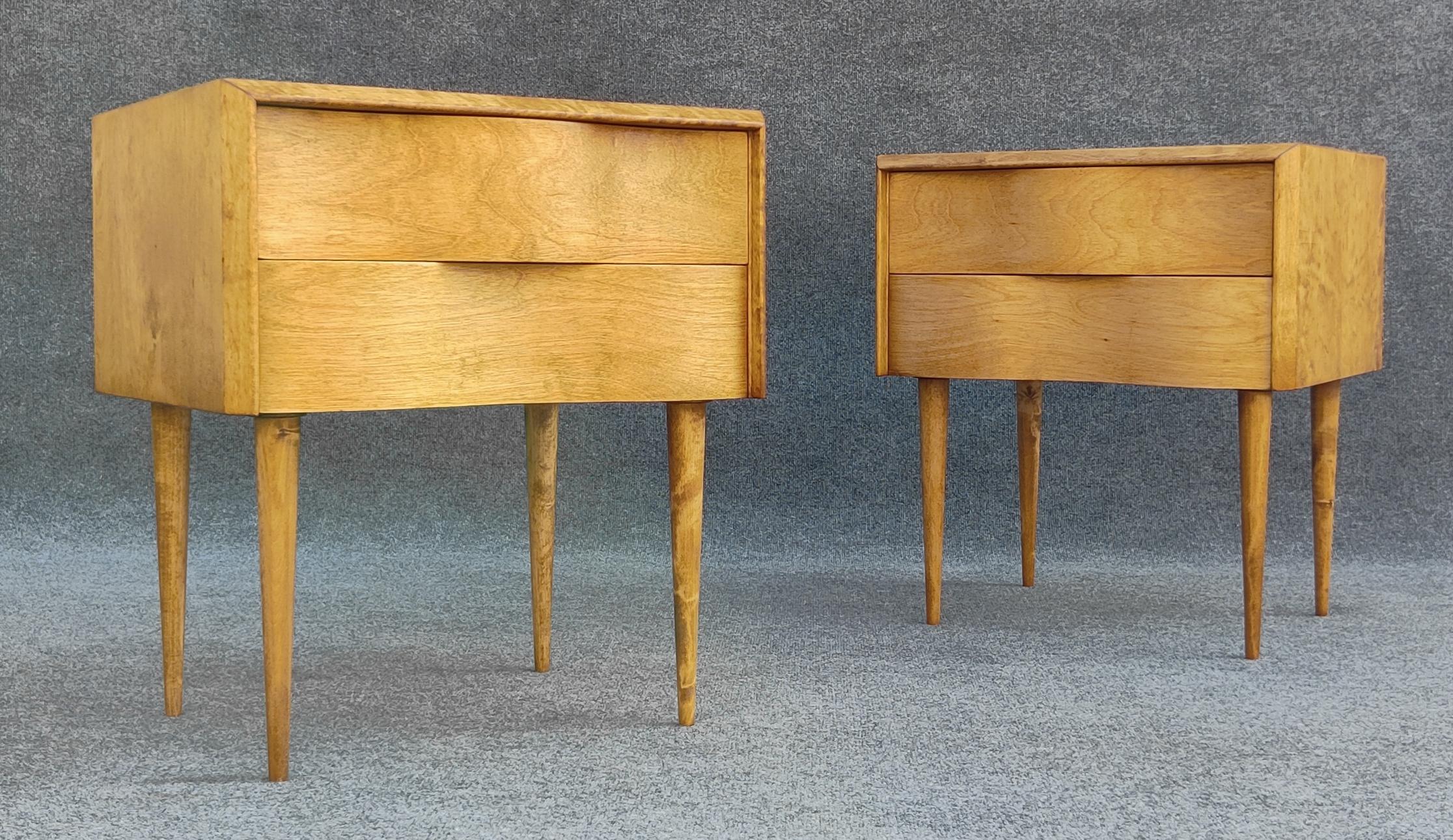 By esteemed designer Edmond Spence, these nightstands or end tables were made in Sweden for retail in the United States by Walpole Furniture. Made in the 1950s, they are reminiscent of high-end Swedish design, which was a powerful player in