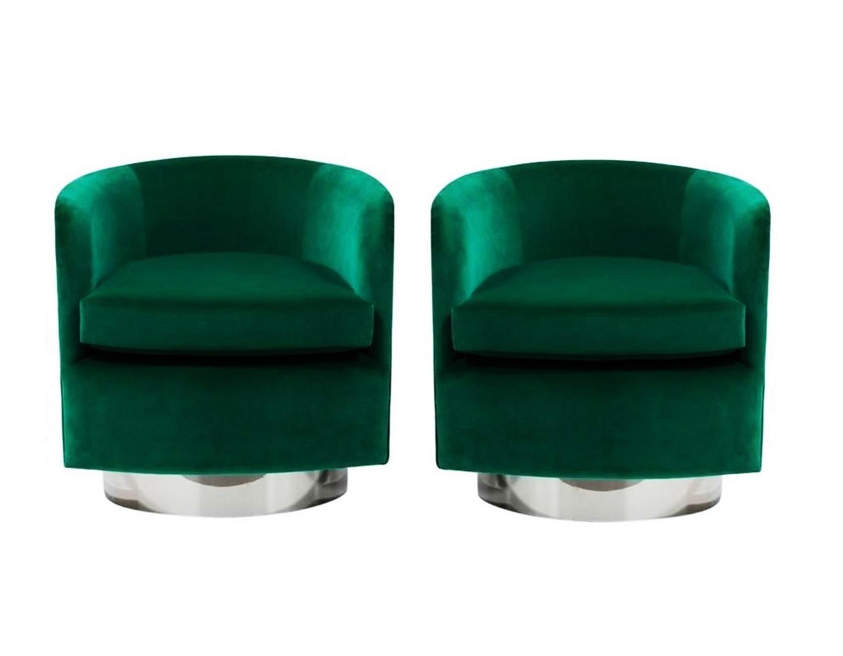 This stunning pair of heirloom quality barrel chairs by Milo Baughman for Thayer Coggin. Super high style, swivel chairs recovered in a luxurious green colored velvet upholstery that contrasts beautifully against the gleaming mirror-finish chrome
