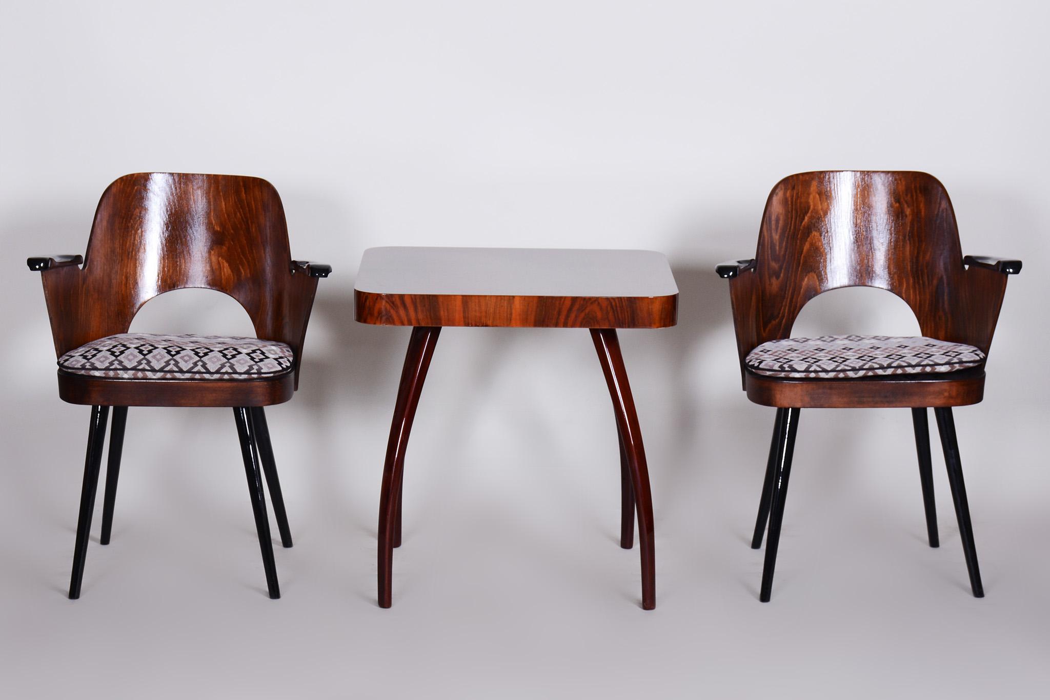 Restored Pair of midcentury armchairs by Oswald Heardtl.

Source: Czechia
Period: 1950-1950
Material: Beech, Fabric

New polish and professional upholstery.