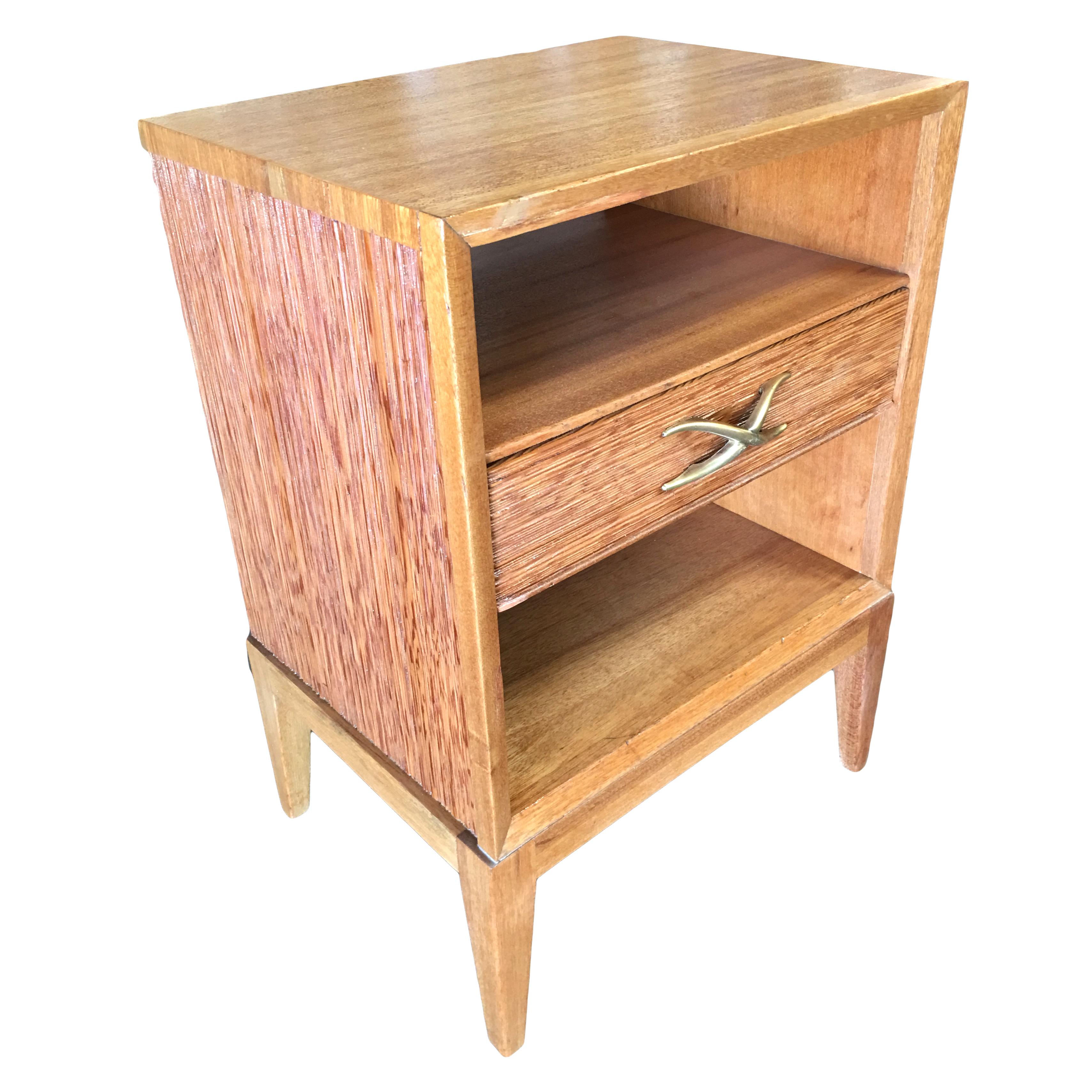 Mid Century bedside stands by Paul Frankl for Brown Saltman company features his trademark combed wood sides with brass 