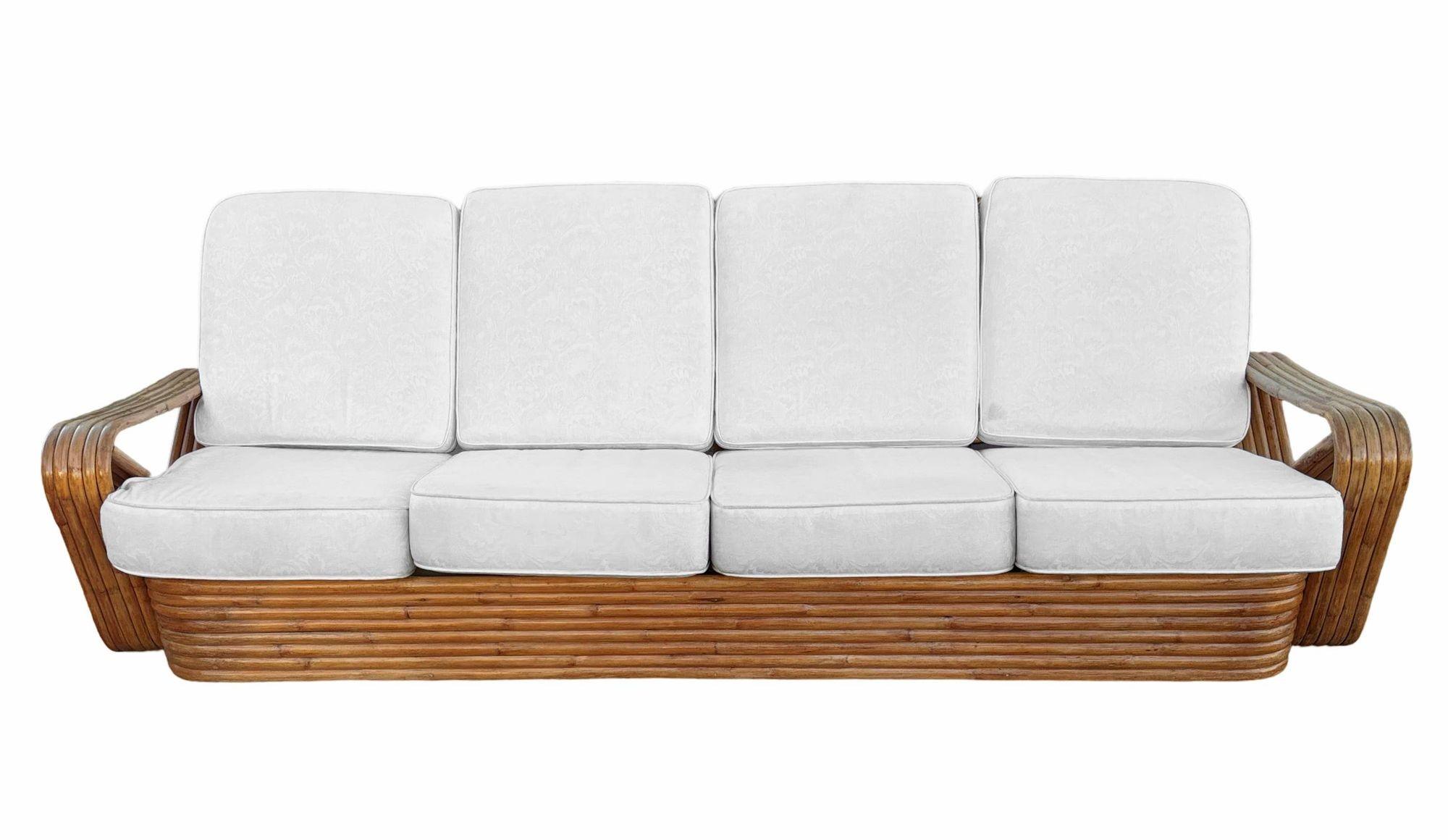 This beautifully restored rattan 5-Strand square pretzel 4-Seat Sofa offers spacious seating with a solid, durable base. It blends Paul Frankl's famous style with tropical charm and modern design. Showcasing exquisite craftsmanship with the iconic