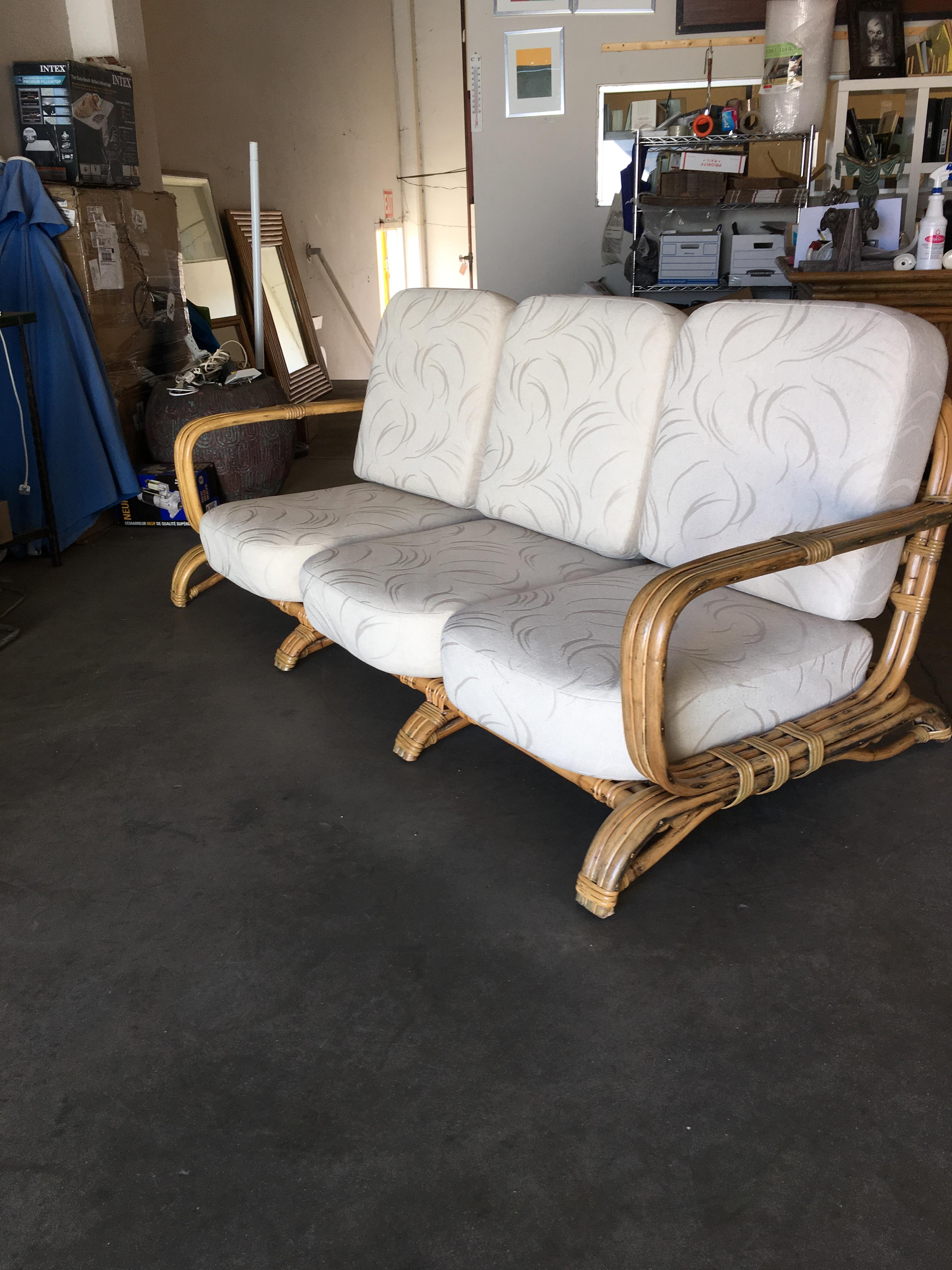 Restored Paul Frankl Original Wrap around 3-Seat Sofa with 3-Pole Rattan Design In Excellent Condition In Van Nuys, CA