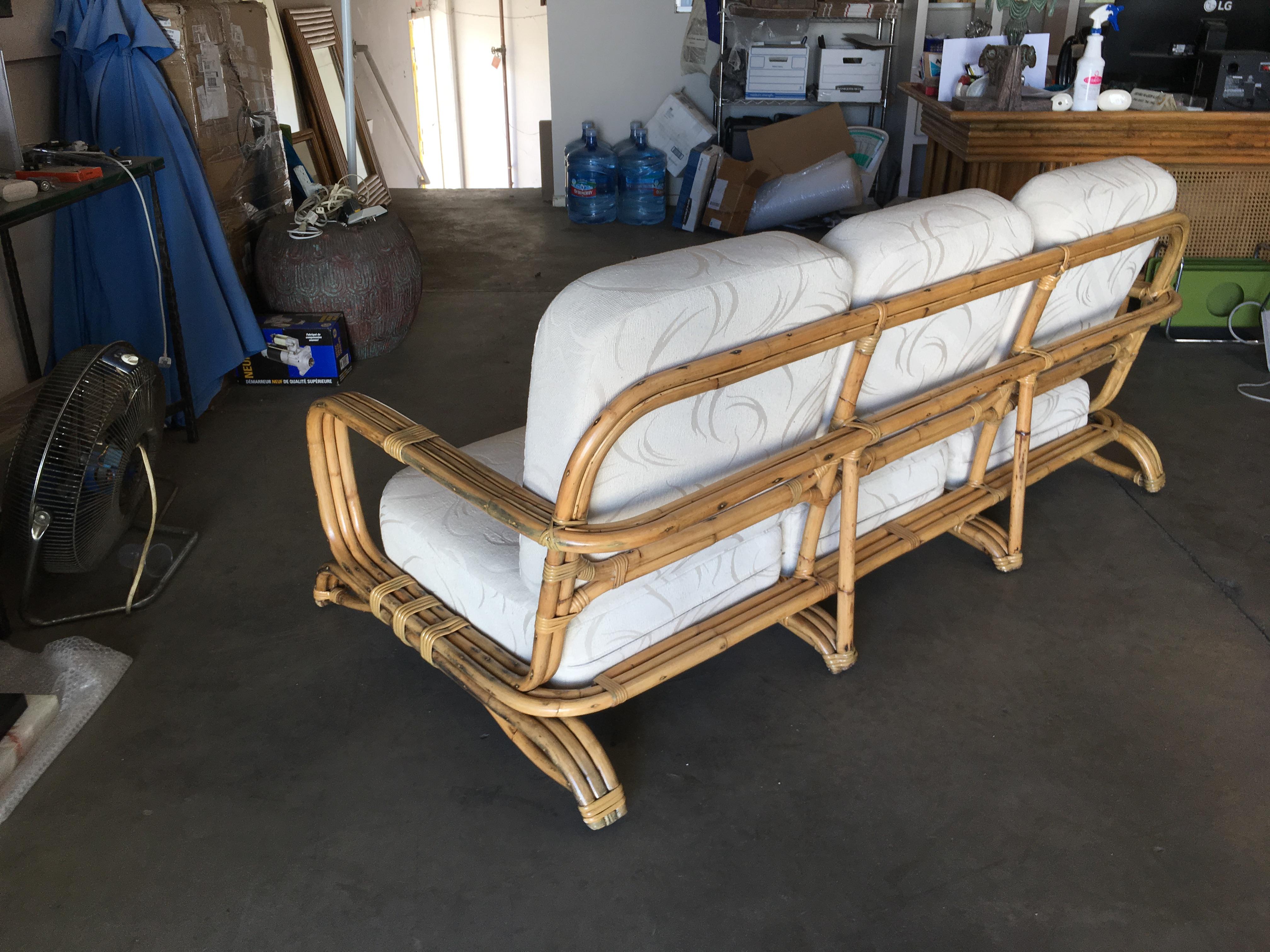 Mid-20th Century Restored Paul Frankl Original Wrap around 3-Seat Sofa with 3-Pole Rattan Design